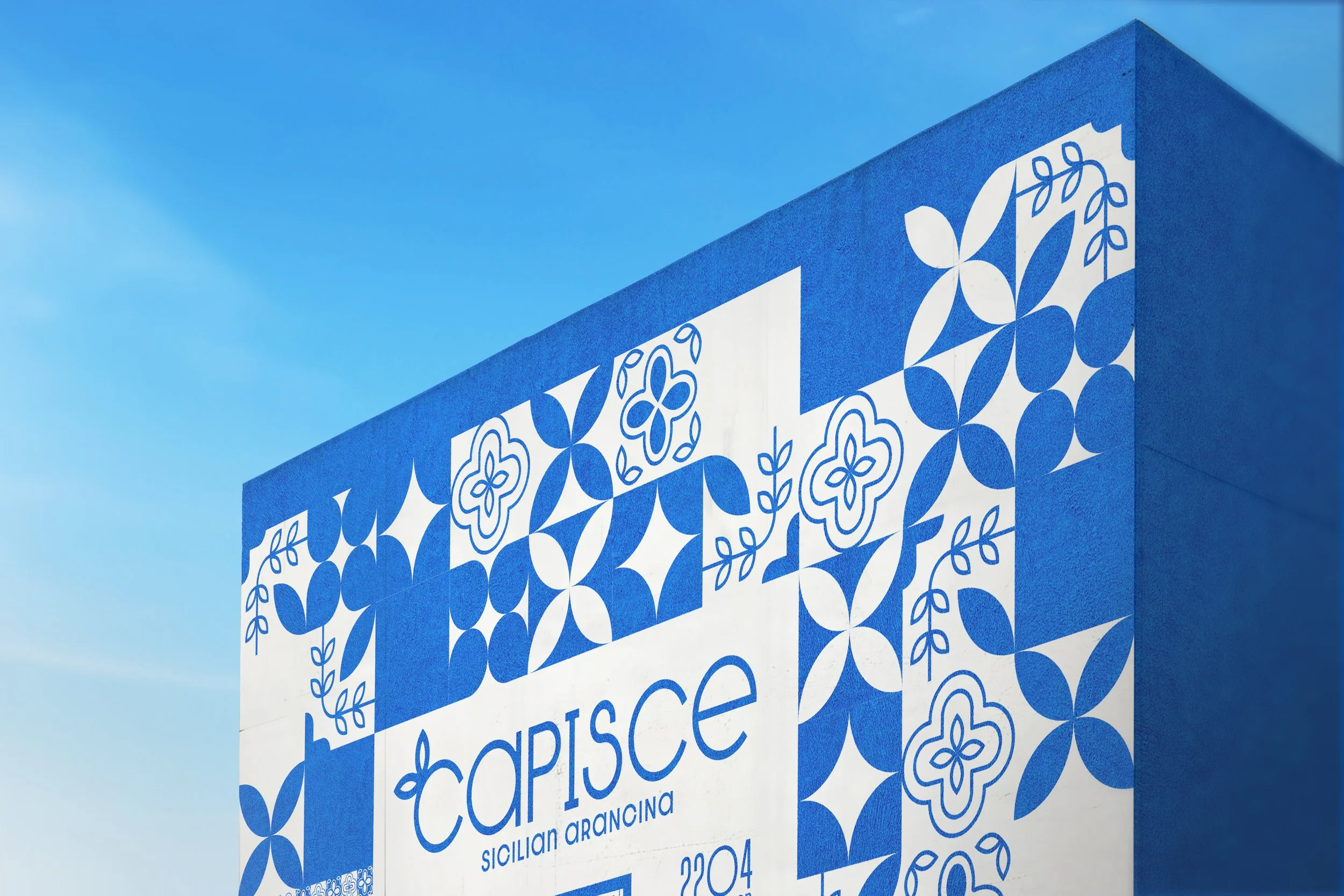 Exterior of Capisce Sicilian Aracina Outdoor Restaurant with a Blue Costal Tile Design on the exterior