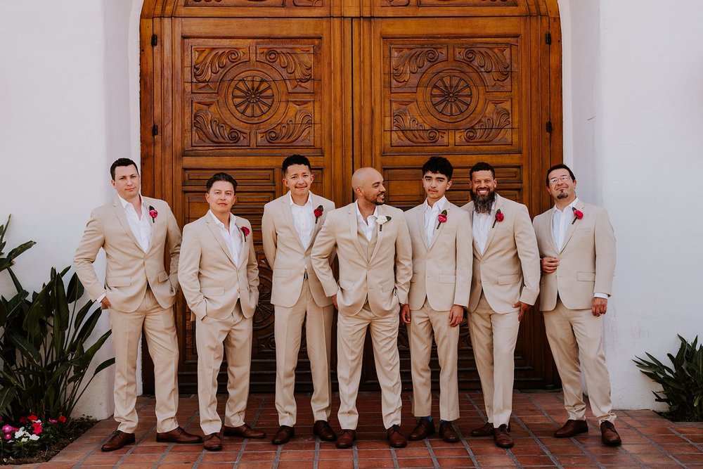 Groom and groomsmen in tan suits at La Quinta Resort wedding in Palm Springs | Photo by Tida Svy