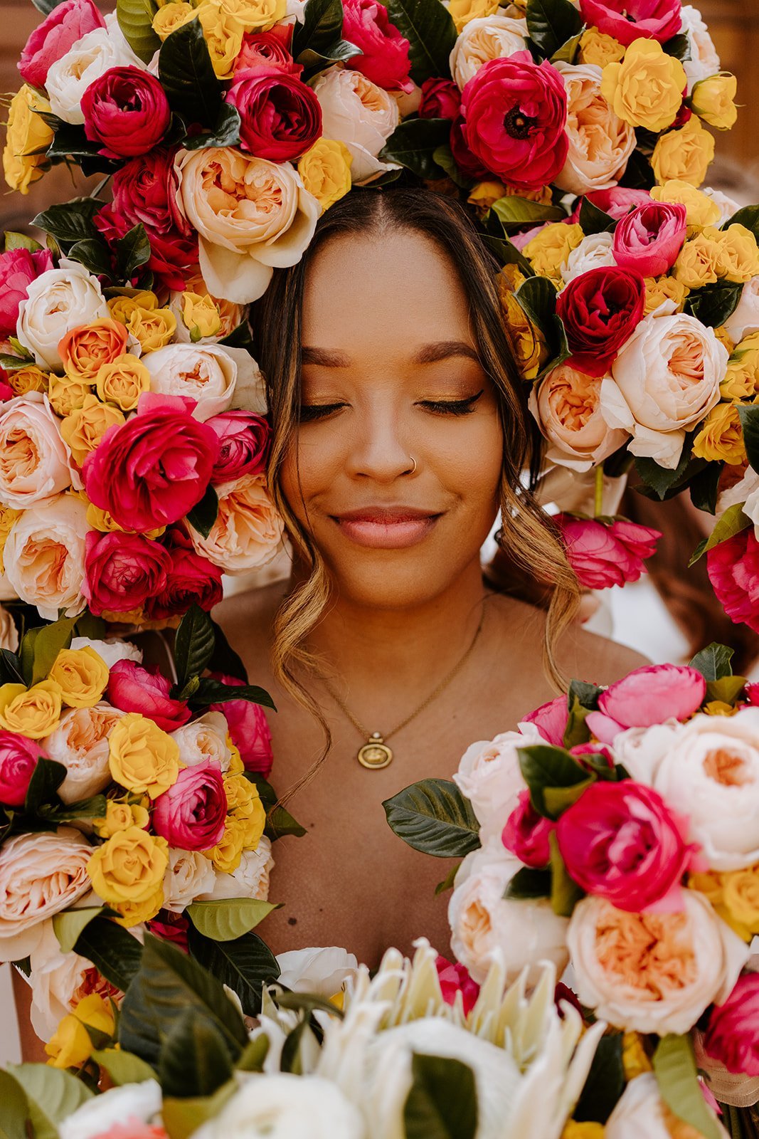  Bride with colorful flowers portrait | Photo by Tida Svy 