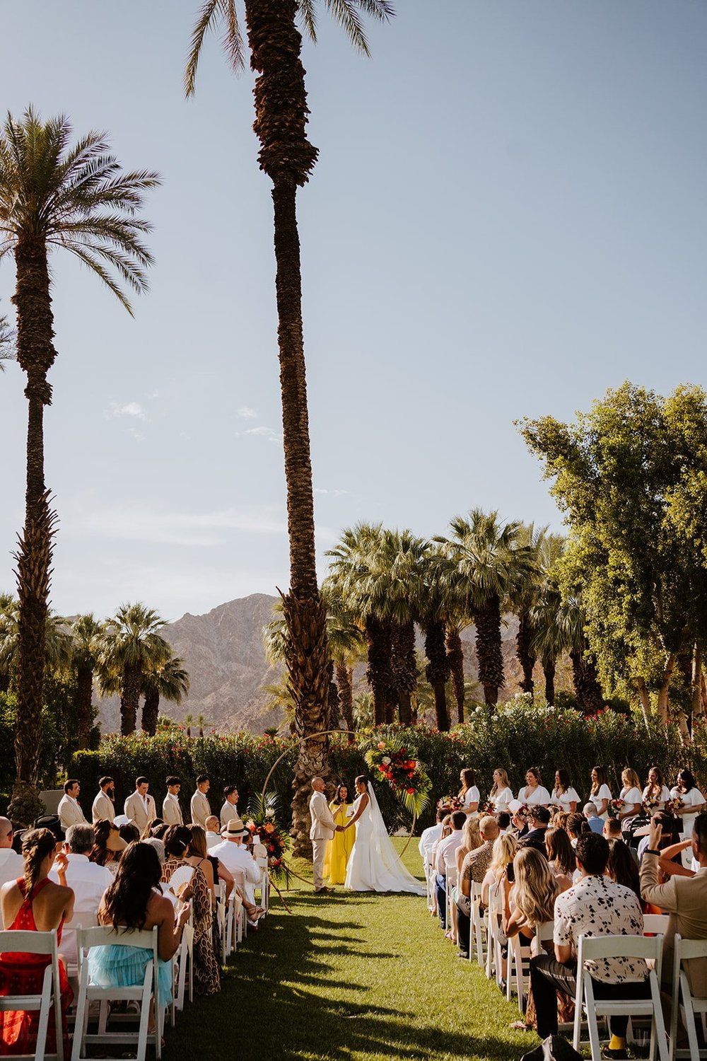 Wedding ceremony at La Quinta Resort in Palm Springs | photo by Tida Svy