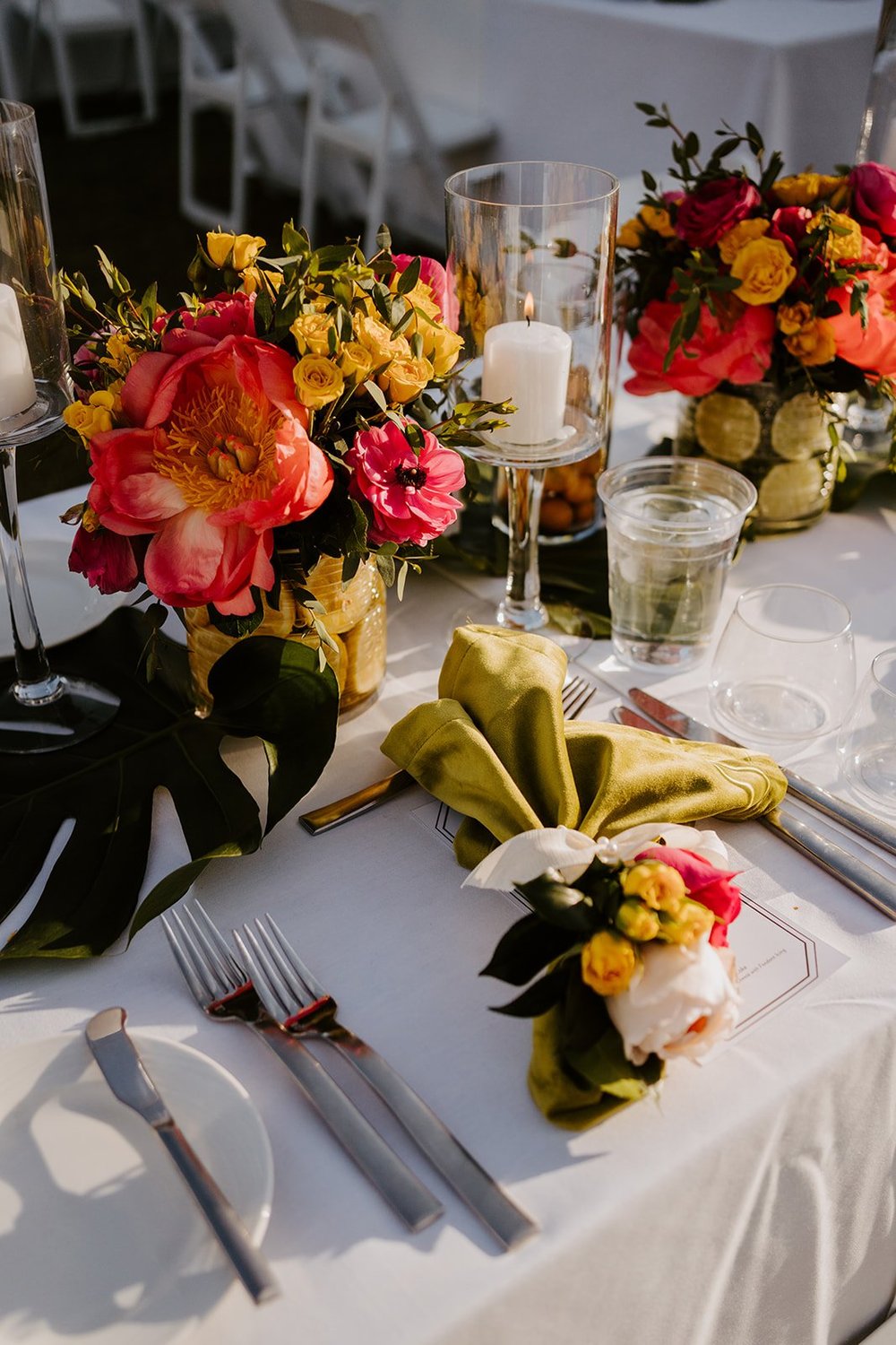 Bright pink and orange wedding table centerpiece, La Quinta Resort Wedding in Palm Springs | Photo by Tida Svy