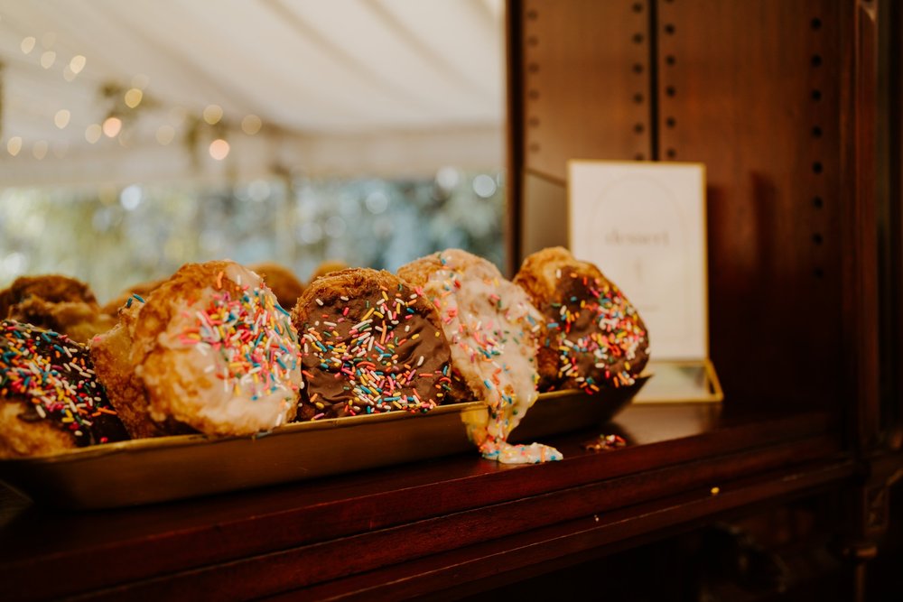 Wedding donut dessert table, Botanica Oceanside wedding reception, San Diego wedding venue, photo by TIda Svy, San Diego wedding photographer