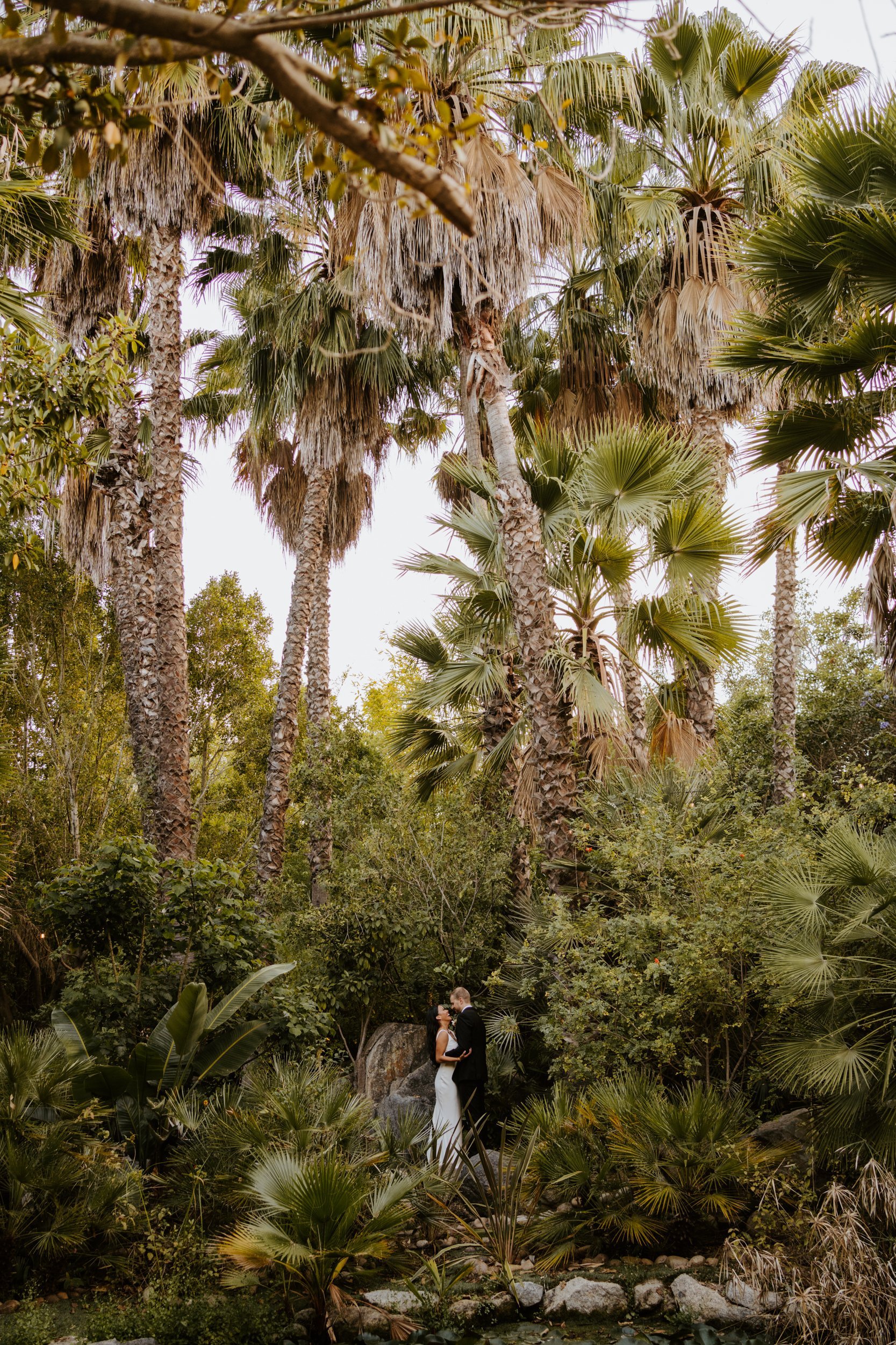  Tropical bride and groom wedding photos, Botanica Oceanside wedding, San Diego wedding venue, photo by TIda Svy, San Diego wedding photographer