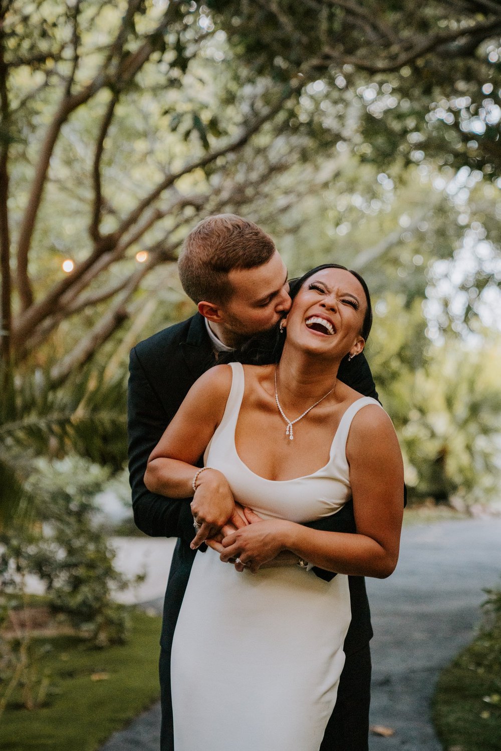 Candid wedding photos, Tropical bride and groom wedding photos, Botanica Oceanside wedding, San Diego wedding venue, photo by TIda Svy, San Diego wedding photographer