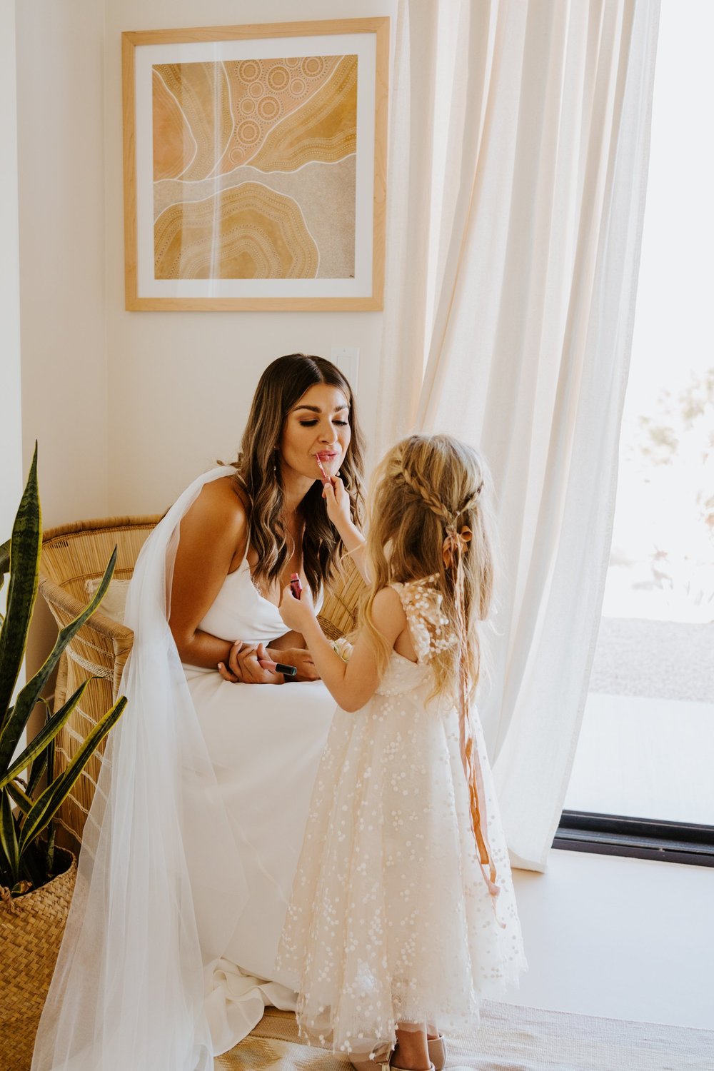 Bride and daughter getting ready, LGBTQ friendly Joshua Tree photographer, Tida Svy