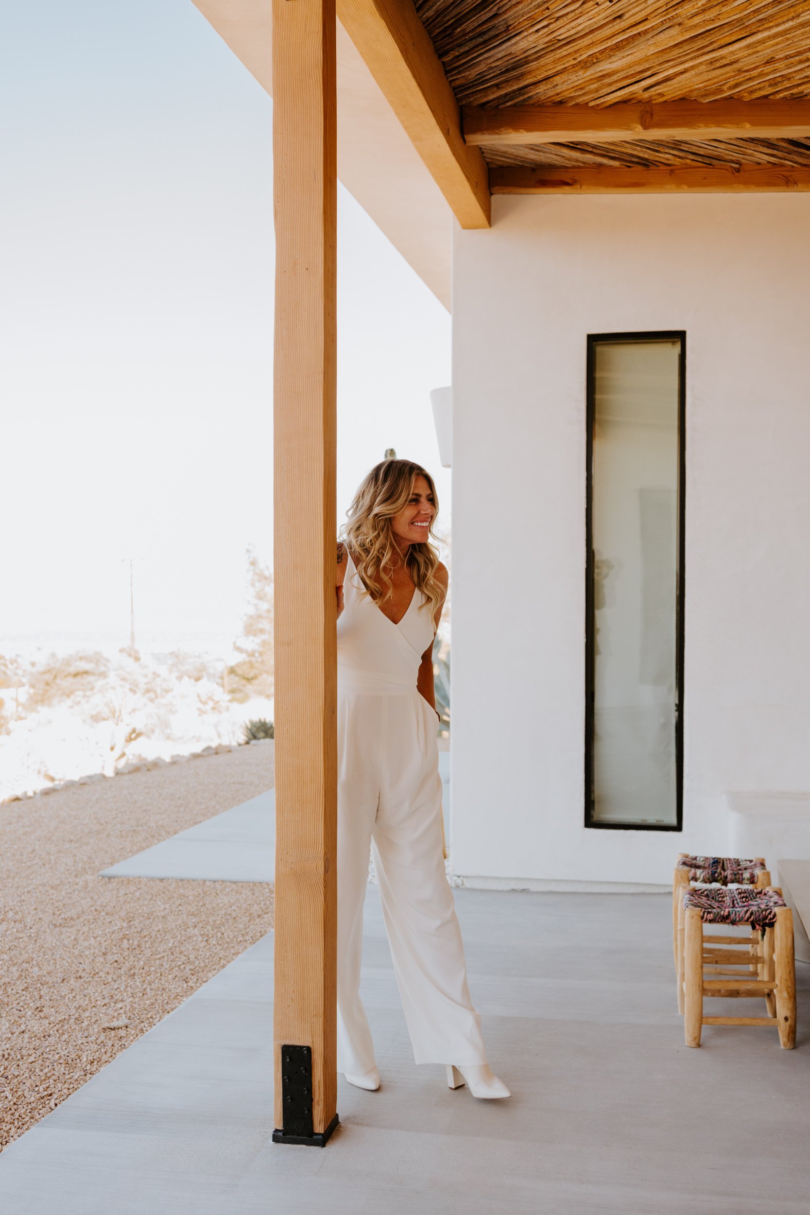 Lesbian first look, LGBTQ Joshua Tree airbnb elopement, Photo by Tida Svy