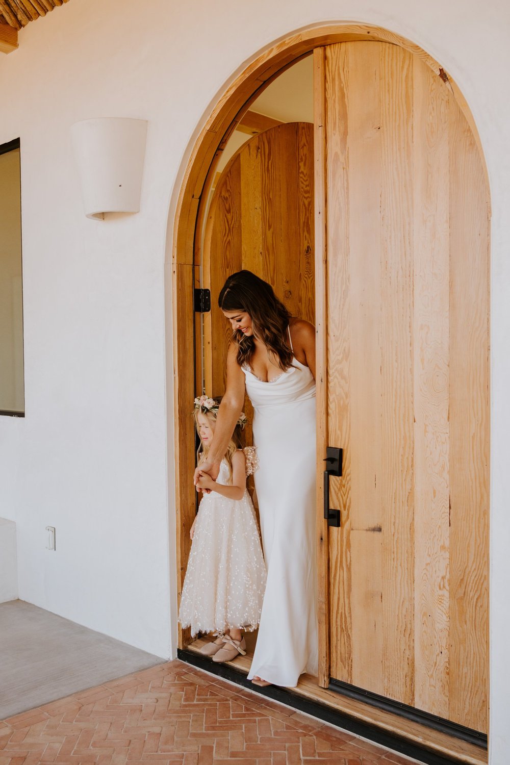 Lesbian first look, LGBTQ Joshua Tree airbnb elopement, Photo by Tida Svy