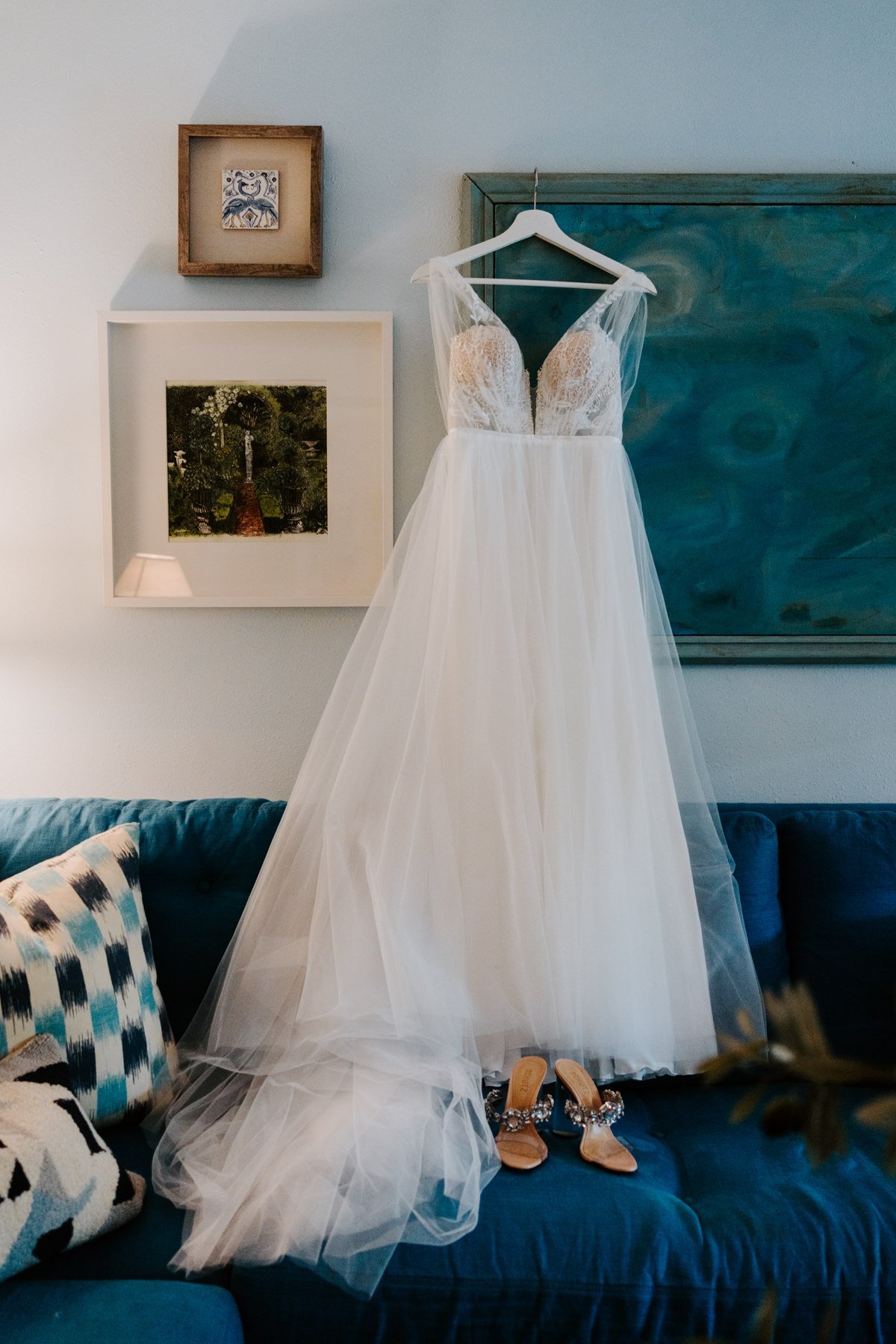 Bride dress hanging in suite at Holiday House Palm Springs, Photo by Tida Svy, Palm Springs Elopement Photographer