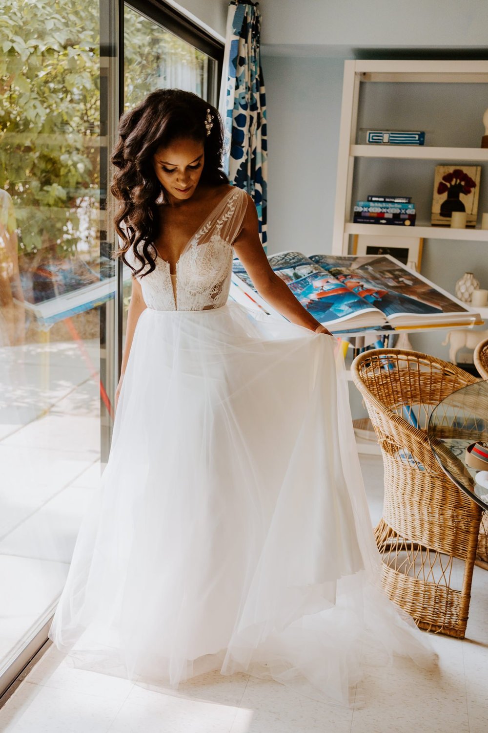 Bride getting ready in suite at Holiday House Palm Springs, Photo by Tida Svy, Palm Springs Elopement Photographer