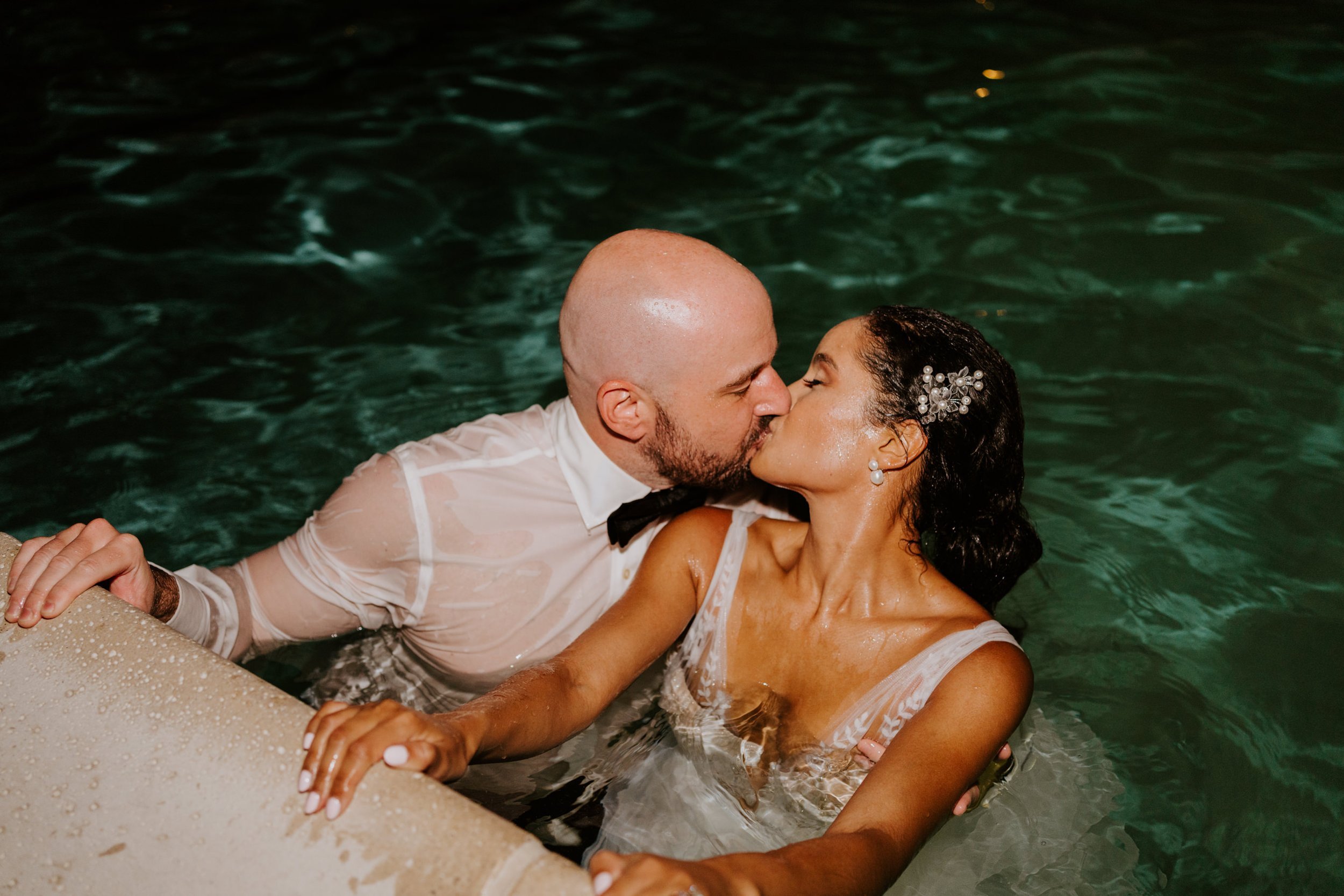 Bride and groom jumping in the pool, Holiday House Palm Springs Wedding, Palm Springs Elopement, Photography by Tida Svy