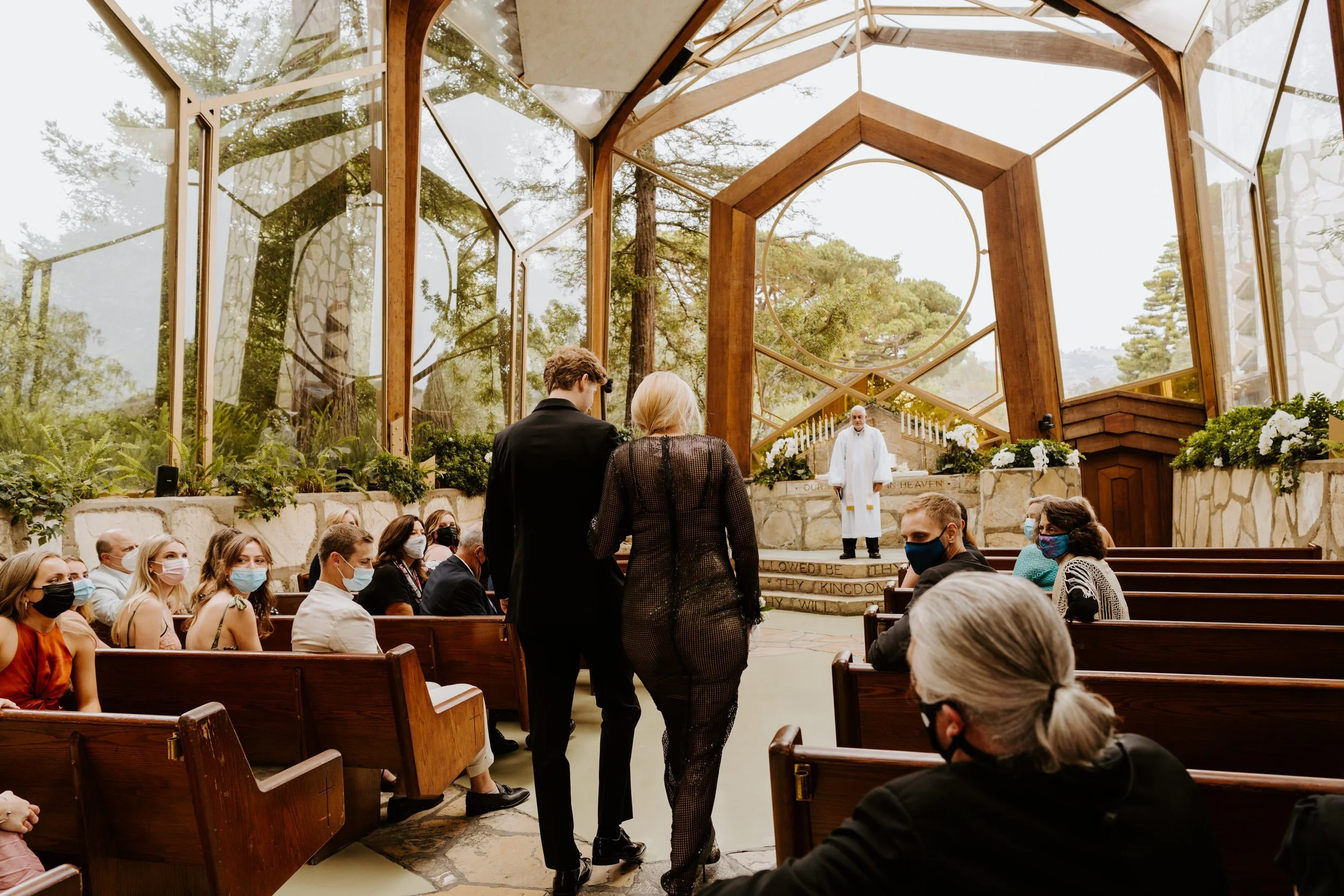 Groom walking mom down the aisle, Wayfarers Chapel Wedding, Photo by Tida Svy, Los Angeles Wedding Photographer