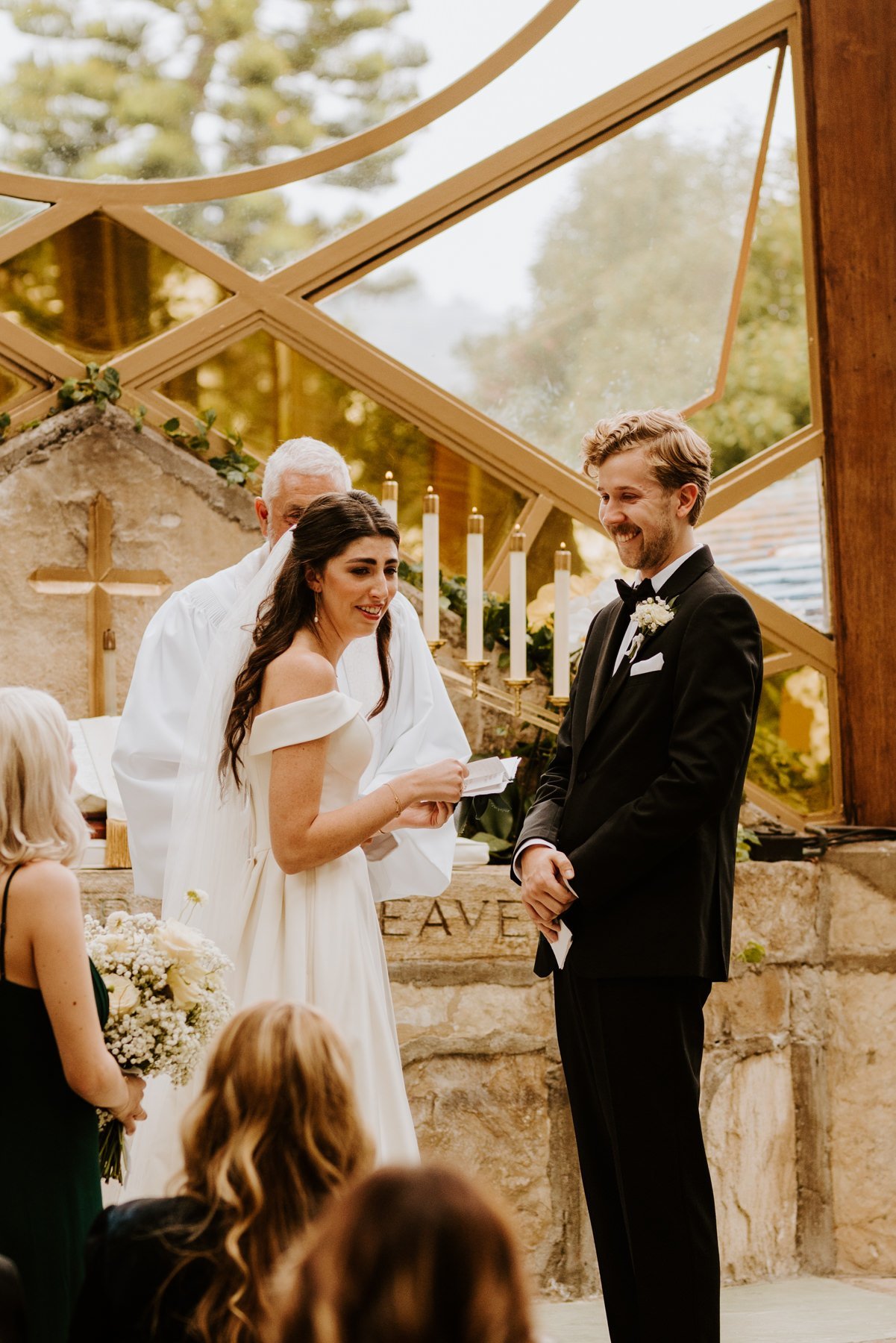 Bride and Groom Vows at Wedding Ceremony at Wayfarers Chapel, Photo by Tida Svy, Los Angeles Wedding Photographer