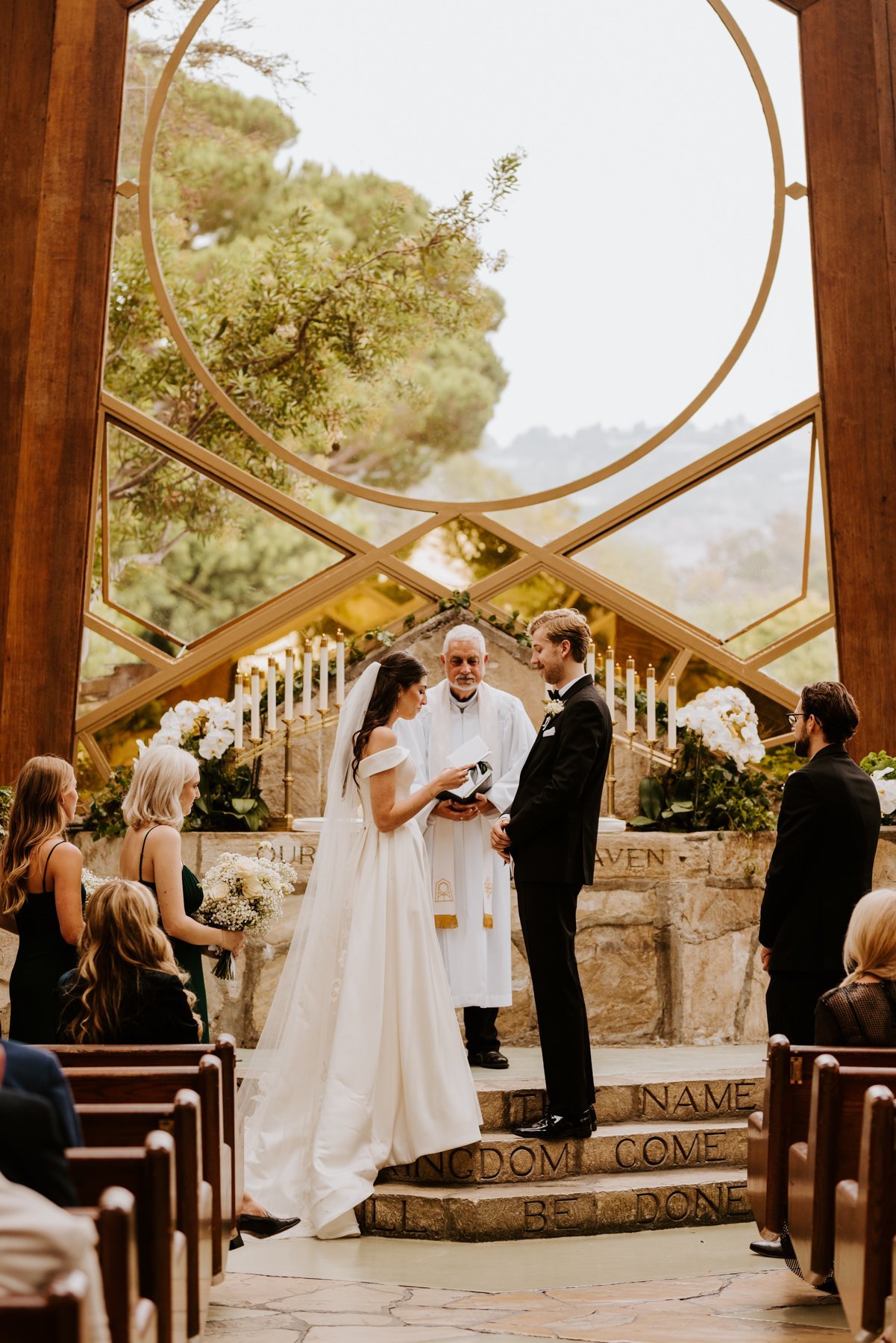 Bride and Groom Vows at Wedding Ceremony at Wayfarers Chapel, Photo by Tida Svy, Los Angeles Wedding Photographer