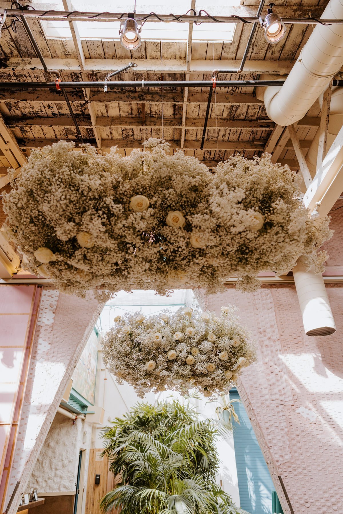 Whimsical floating floral cloud wedding reception decor, grass room dtla, photo by tida svy, los angeles wedding photographer