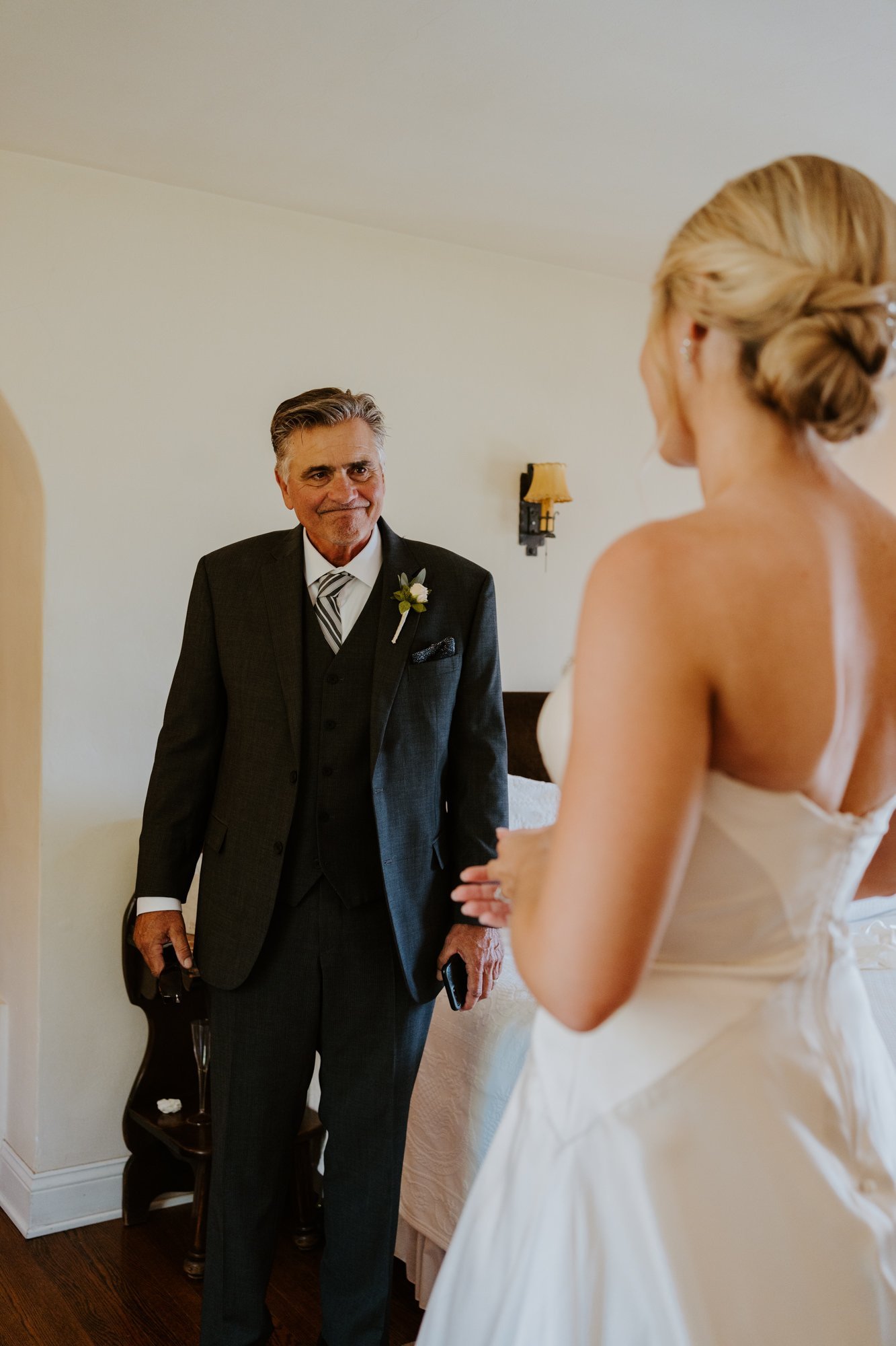 Bride and father of the bride first look while getting ready at The O’Donnell House wedding in Palm Springs, photography by Tida Svy