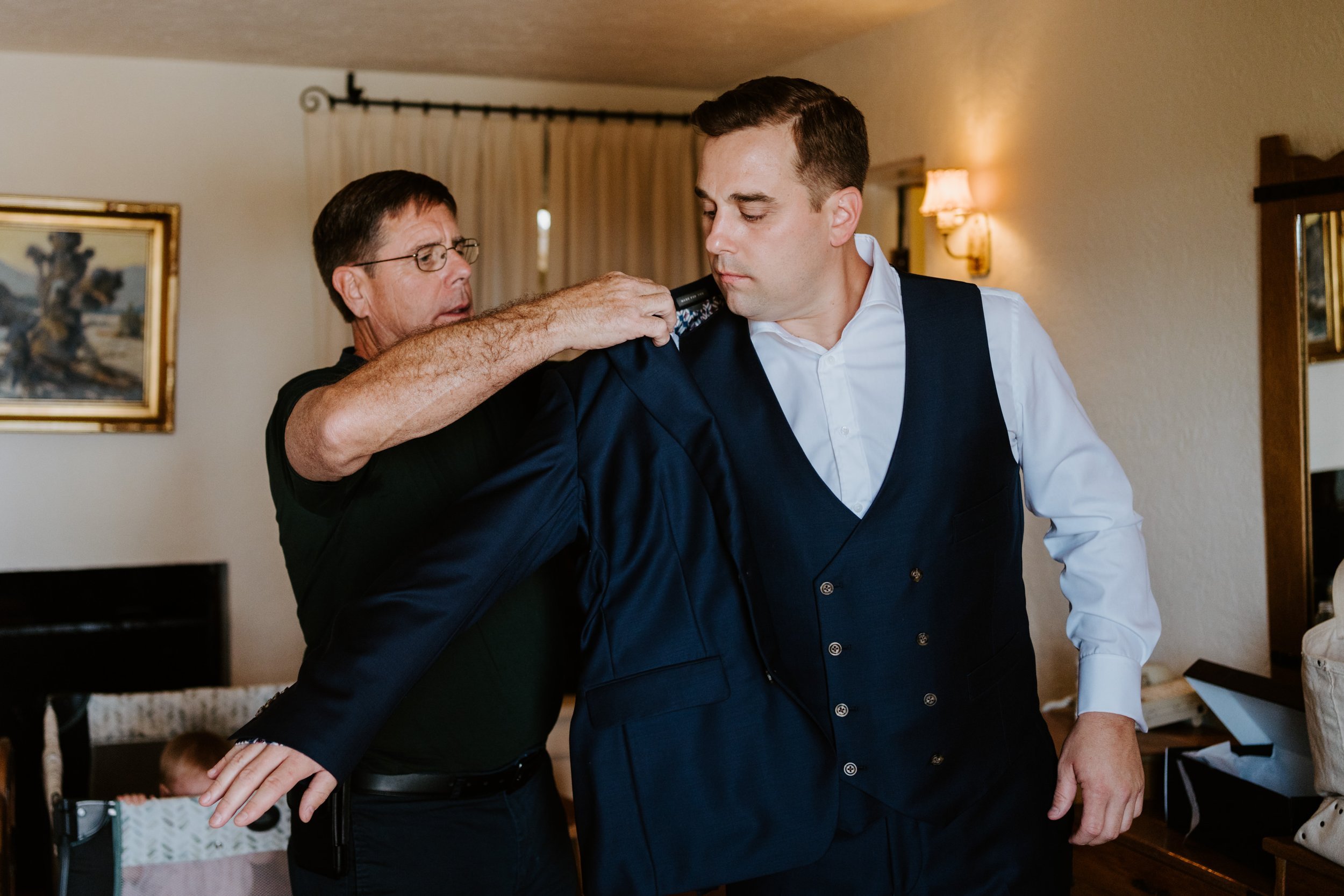 Groom and father of the groom getting ready at The O’Donnell House wedding in Palm Springs, photography by Tida Svy