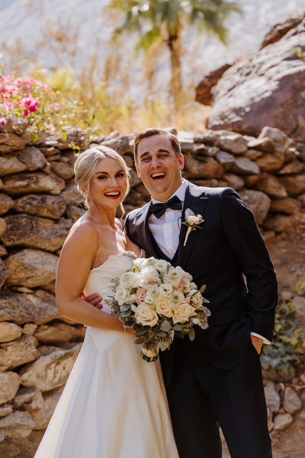 Bride and Groom candid laughing photo at The O’Donnell House Palm Springs, photography by Tida Svy