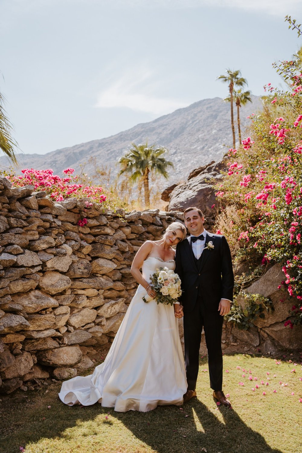 Bride and Groom candid laughing photo at The O’Donnell House Palm Springs, photography by Tida Svy