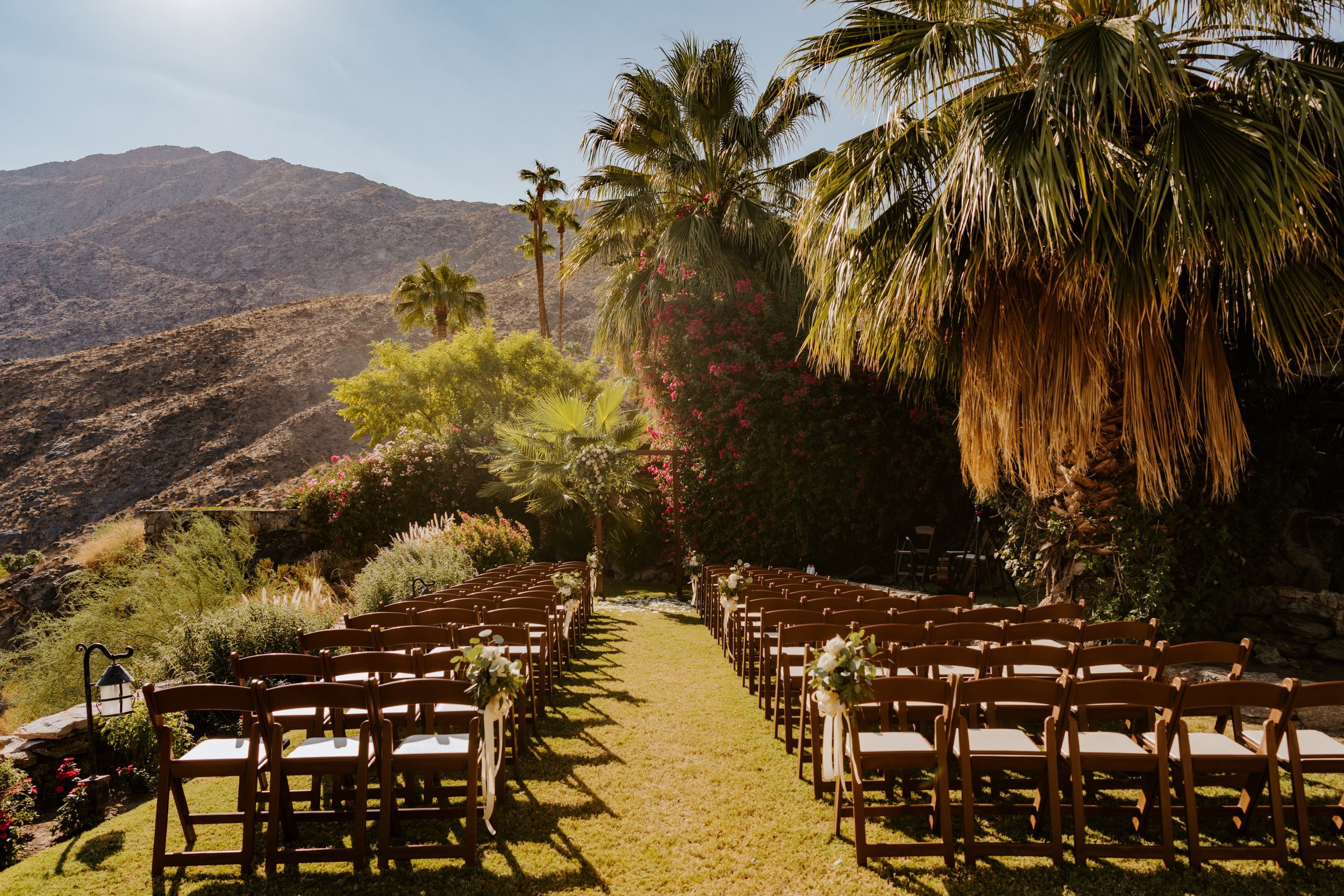 Wedding ceremony setup at The O’Donnell House wedding in Palm Springs, vibrant southern california wedding photography by Tida Svy