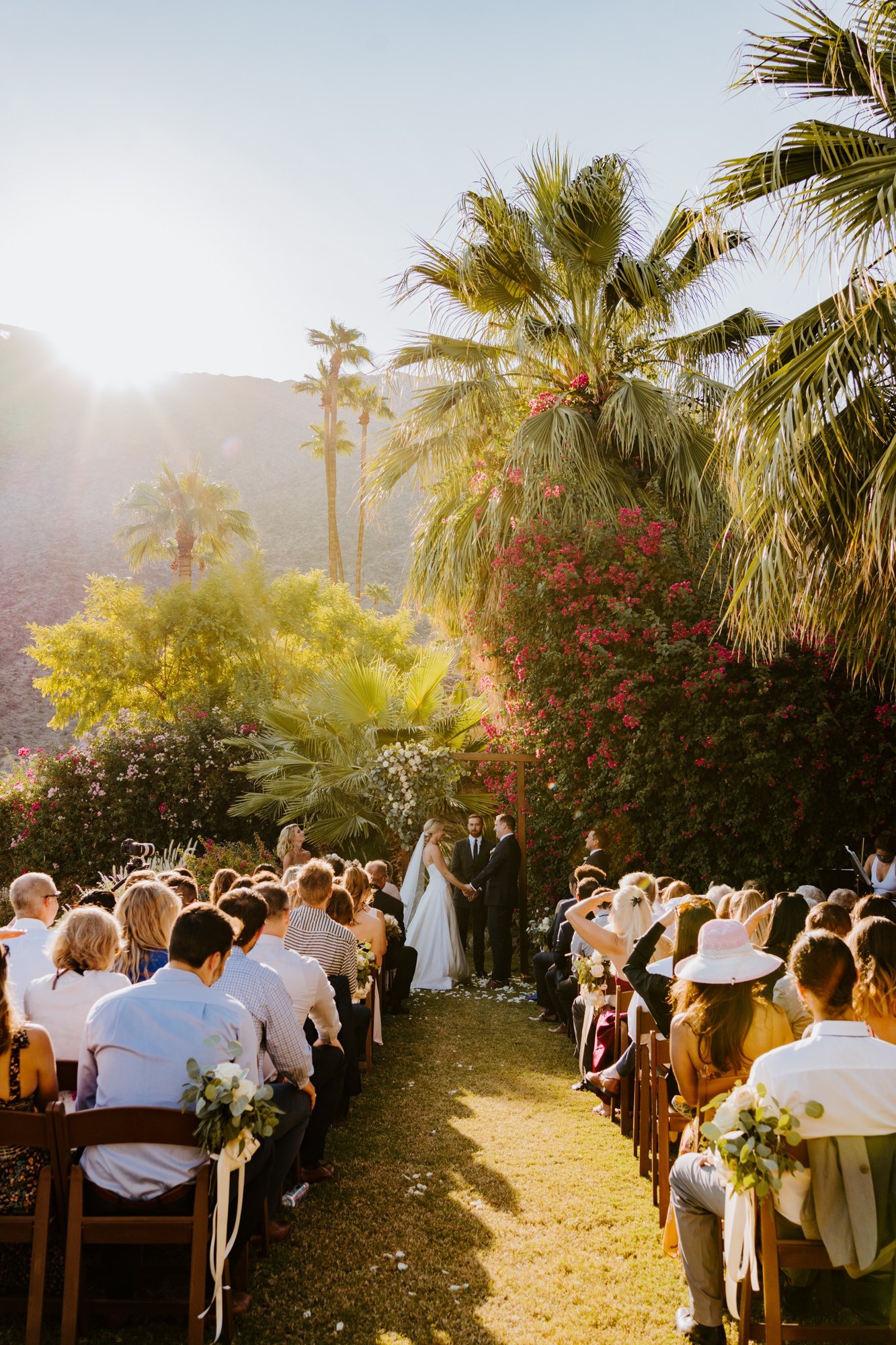 Wedding ceremony setup at The O’Donnell House wedding in Palm Springs, vibrant southern california wedding photography by Tida Svy