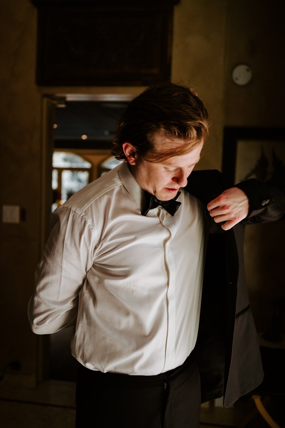 Groom getting ready at The Houdini Estate wedding, Los Angeles wedding photography by Tida Svy