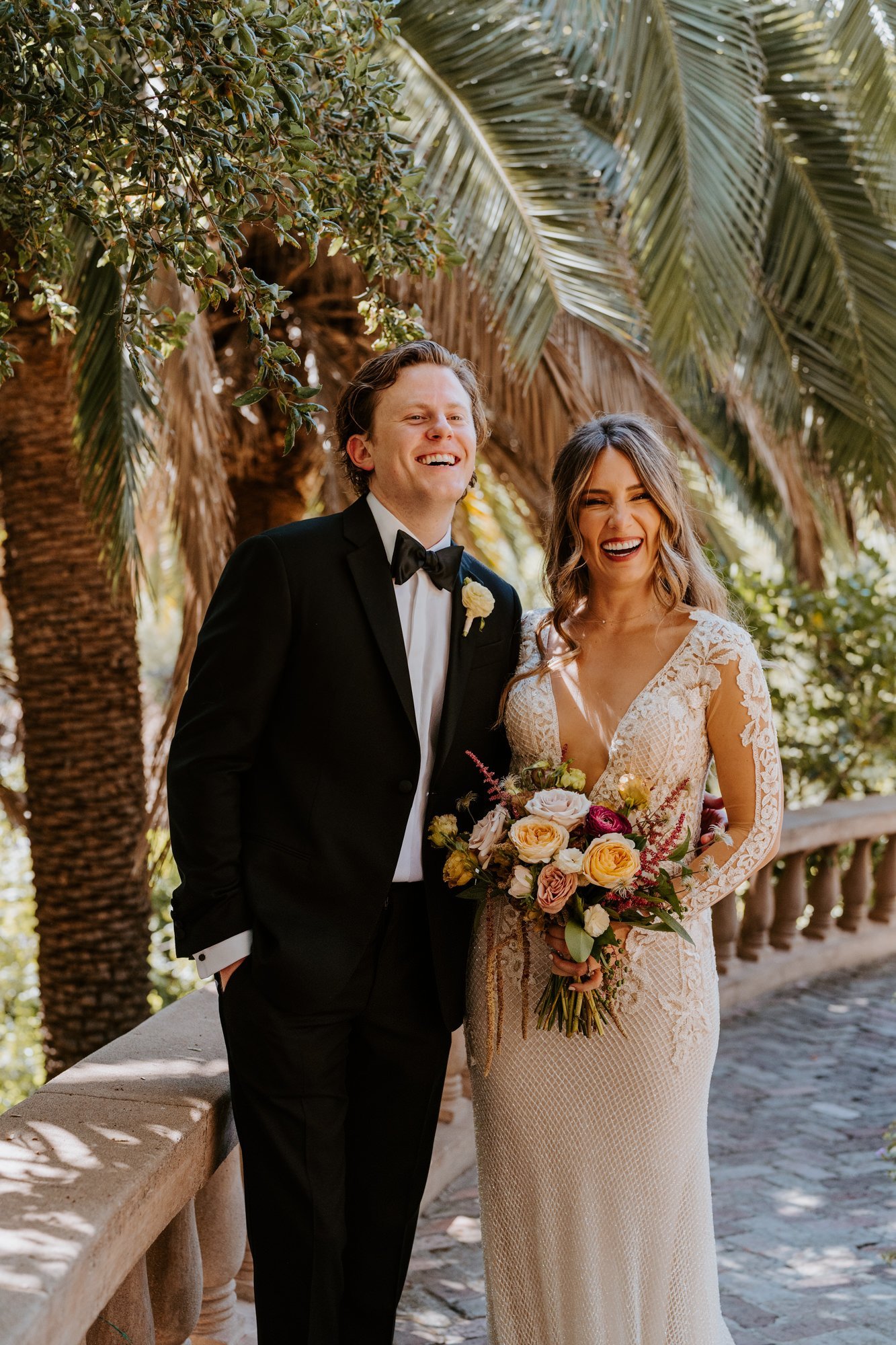 Candid laughing bride and groom portrait at The Houdini Estate wedding in los angeles, ca. Vibrant and candid los angeles wedding photography by Tida Svy