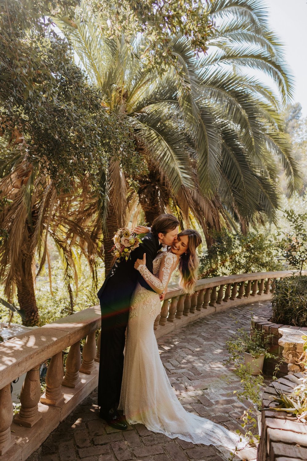 Bride and groom portrait at The Houdini Estate wedding in los angeles, ca. Vibrant and candid los angeles wedding photography by Tida Svy