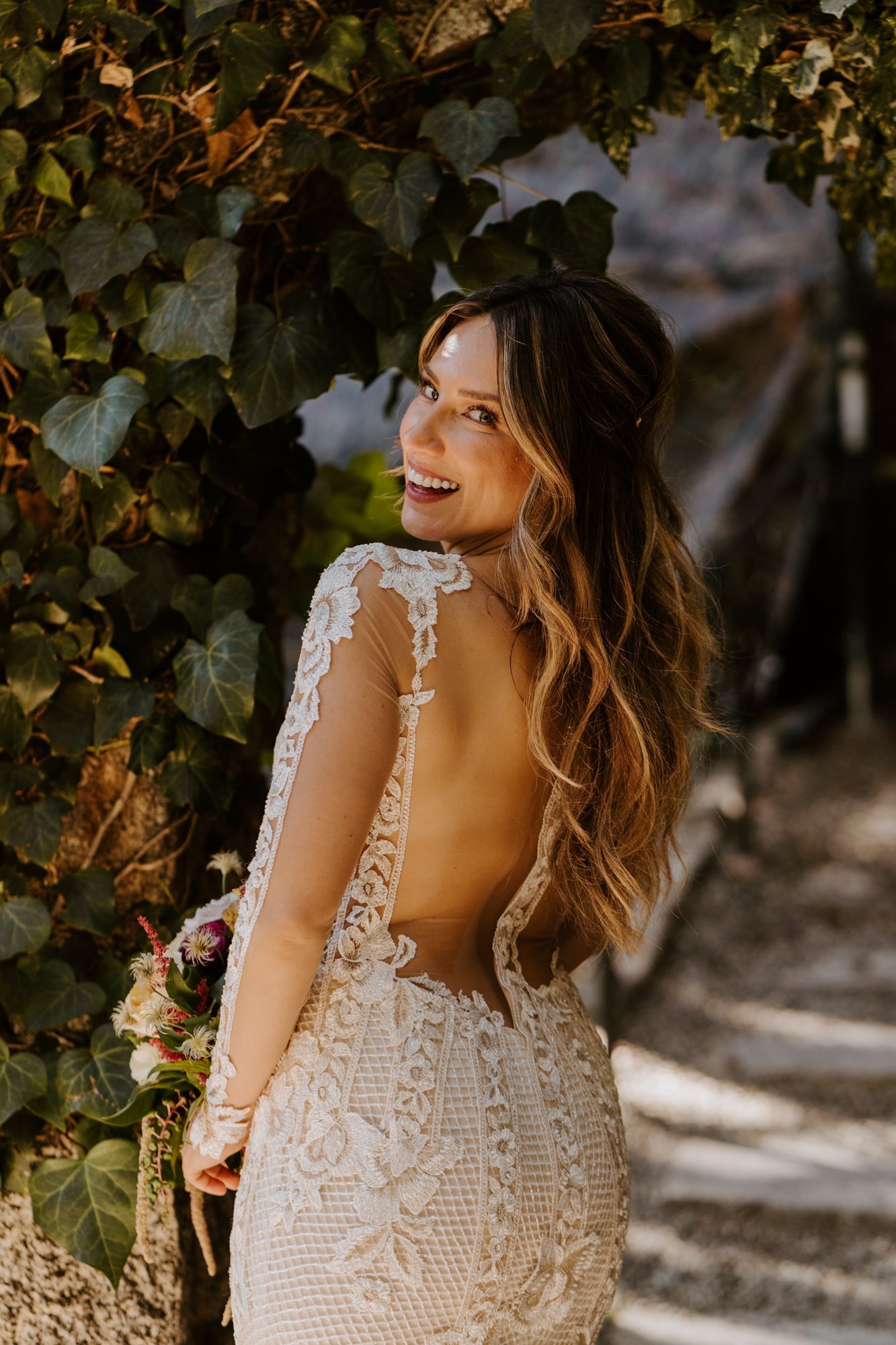 Romantic long sleeve deep V neck Galia Lahav beaded couture wedding dress at The Houdini Estate Wedding in Los Angeles, vibrant and candid wedding photography by Tida Svy