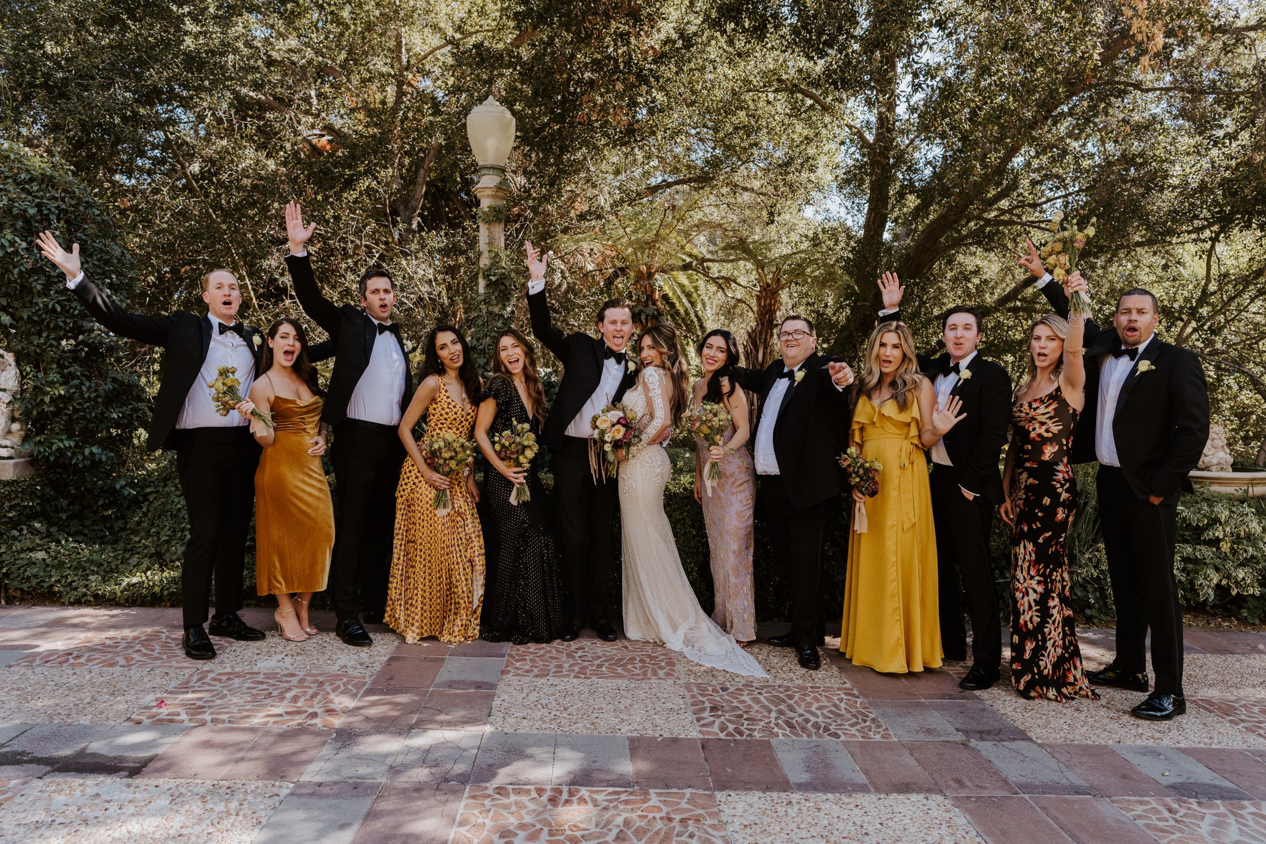 Fun wedding party photos at The Houdini Estate Wedding in Los Angeles, vibrant and candid wedding photographer Tida Svy