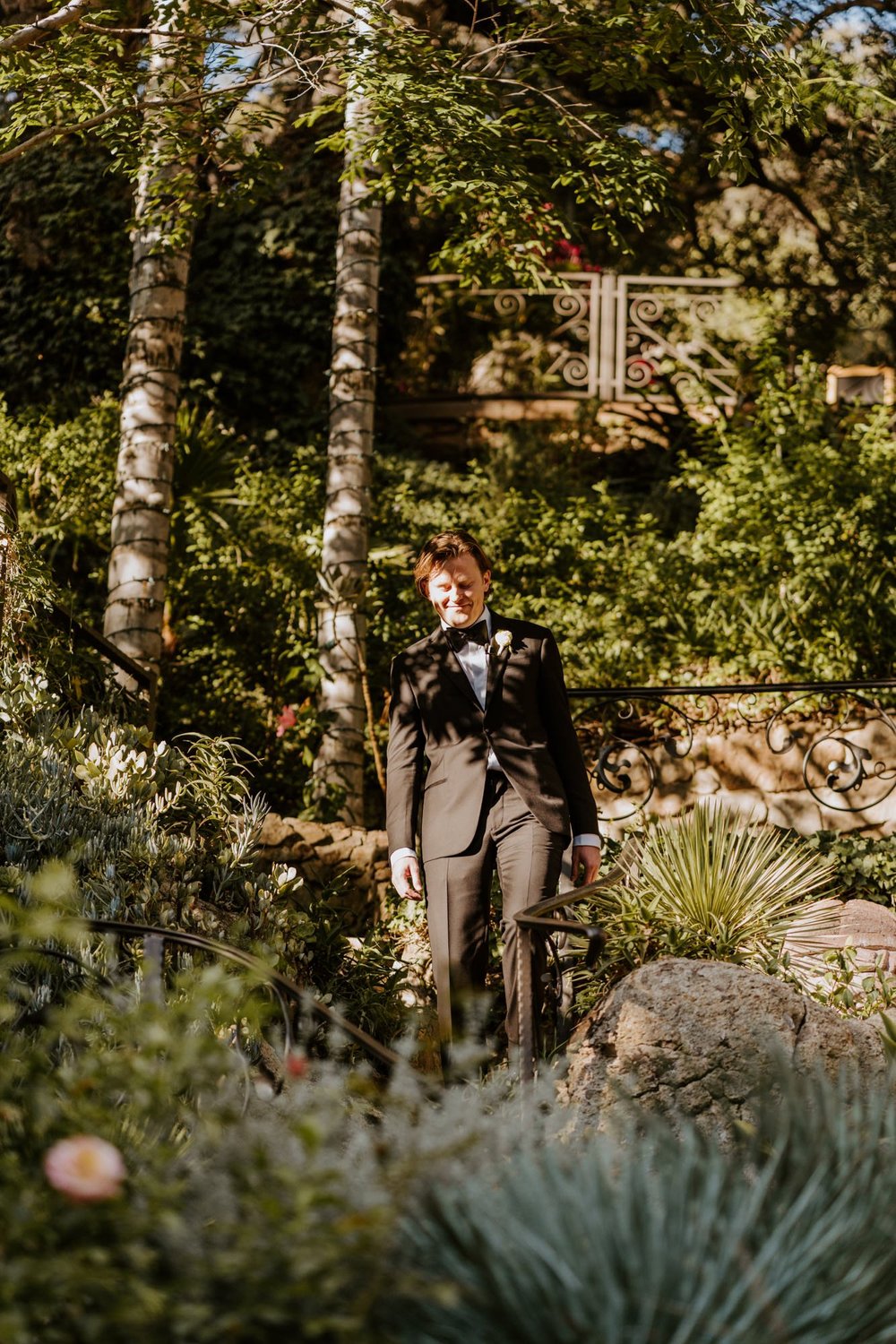 Groom walking down the aisle at Romantic and whimsical wedding ceremony at The Houdini Estate, Los Angeles wedding photography by Tida Svy