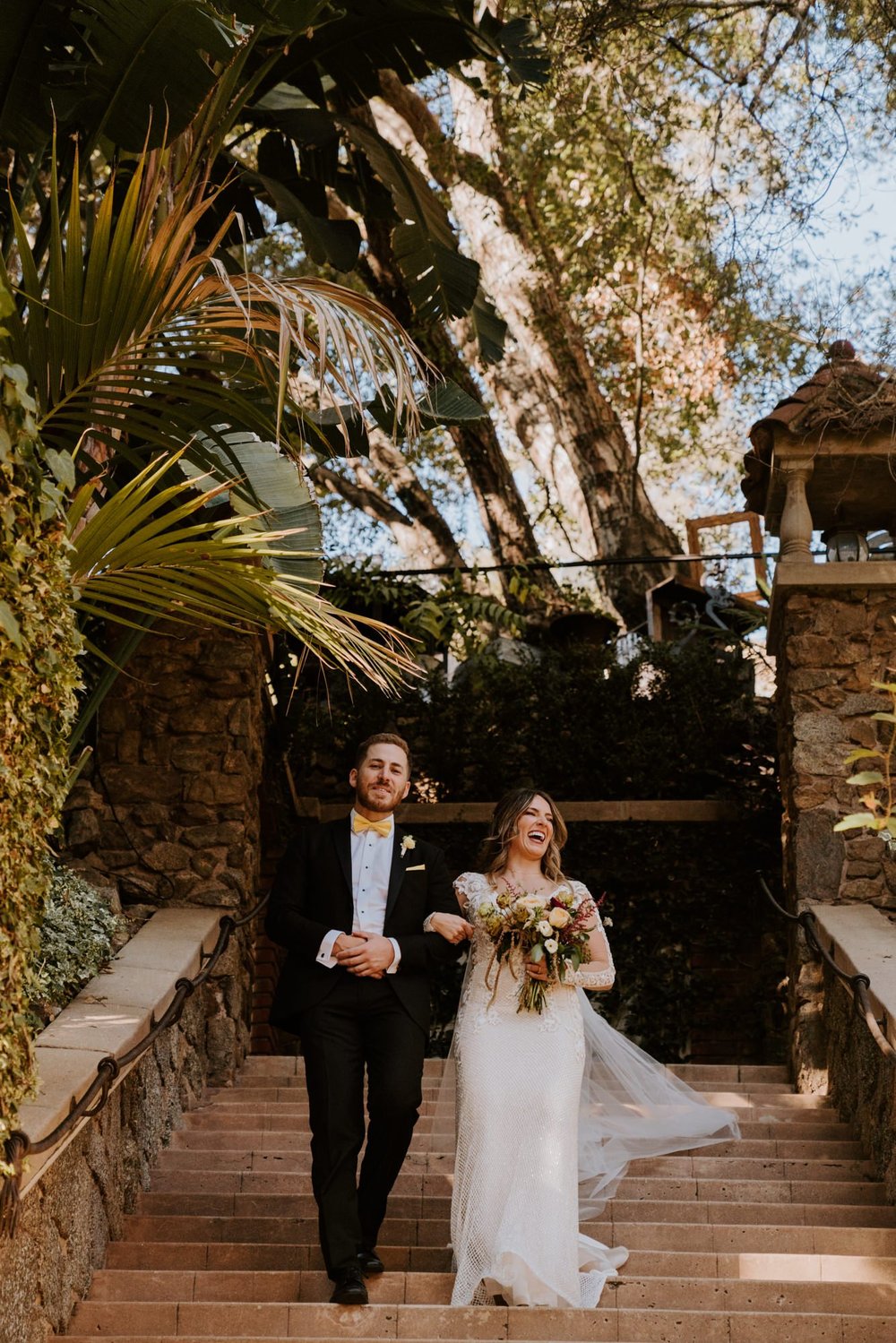 Bride walking down the aisle at The Houdini Estate Wedding Los Angeles photography by Tida Svy