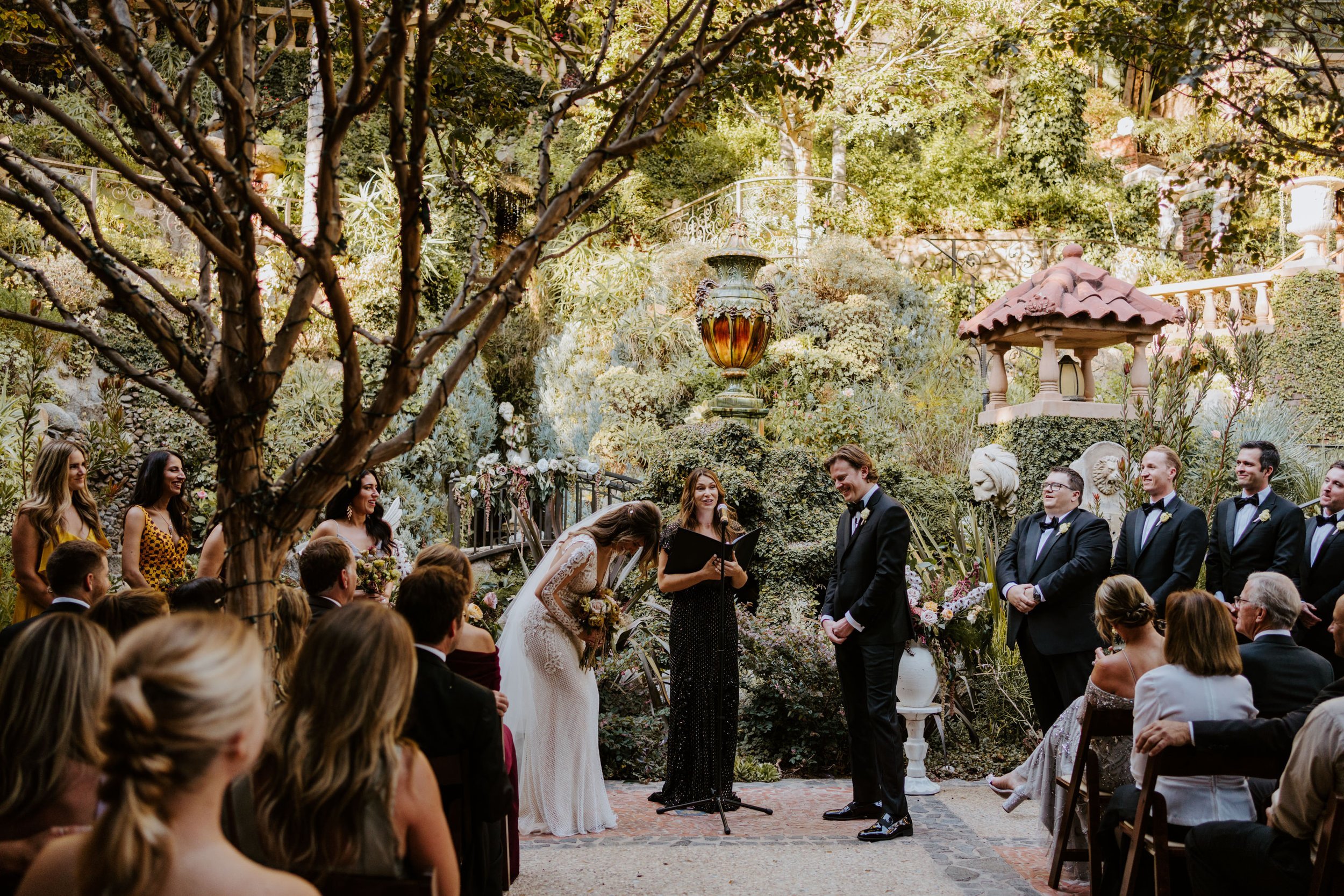 Romantic and whimsical wedding ceremony at The Houdini Estate Wedding Los Angeles photography by Tida Svy