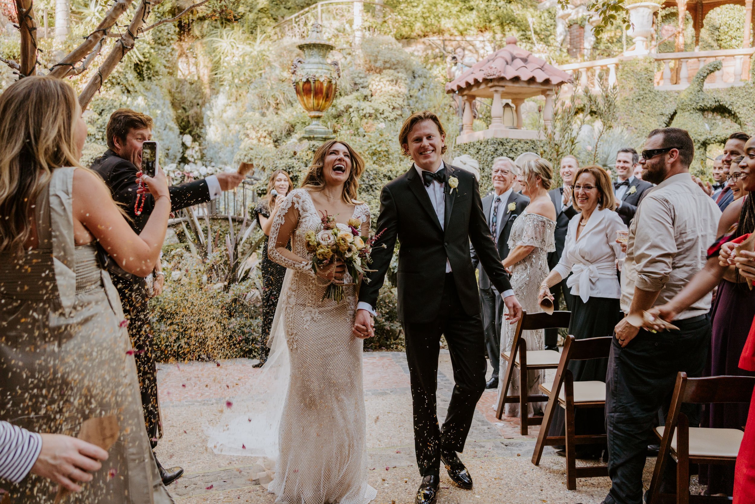 Romantic and whimsical wedding ceremony at The Houdini Estate Wedding Los Angeles photography by Tida Svy