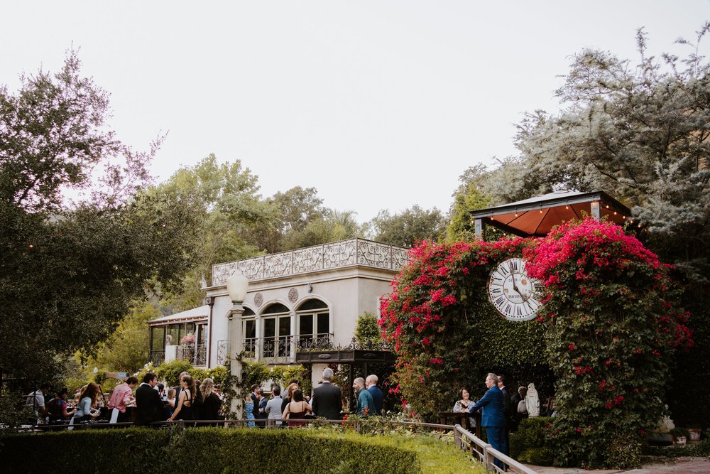 Cocktail hour at The Houdini Estate wedding in Los Angeles, wedding photography by Tida Svy