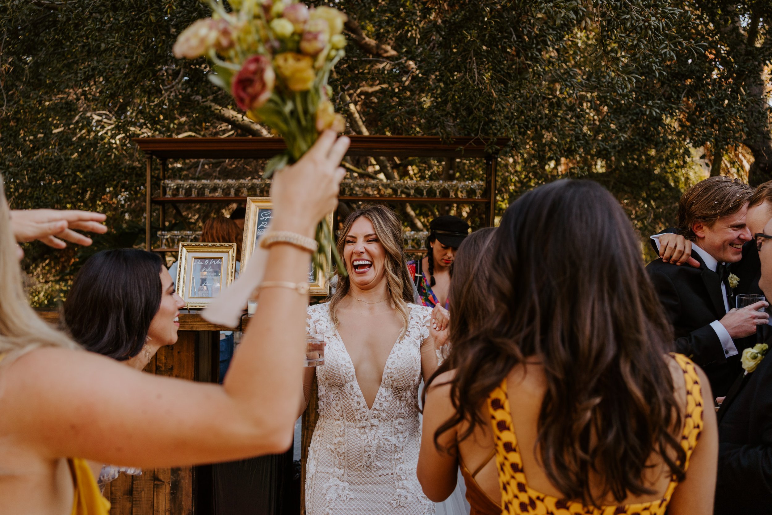 Happy candid laughing cocktail hour at The Houdini Estate wedding in Los Angeles, wedding photography by Tida Svy