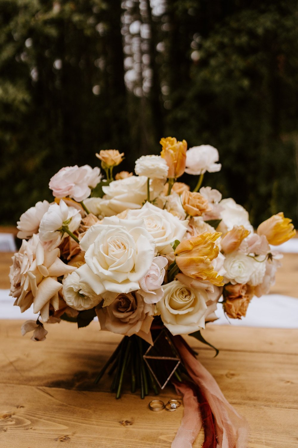 Whimsical and enchanted forest bridal bouquet with beige pink and light neutral tones, photo by Tida Svy Photography