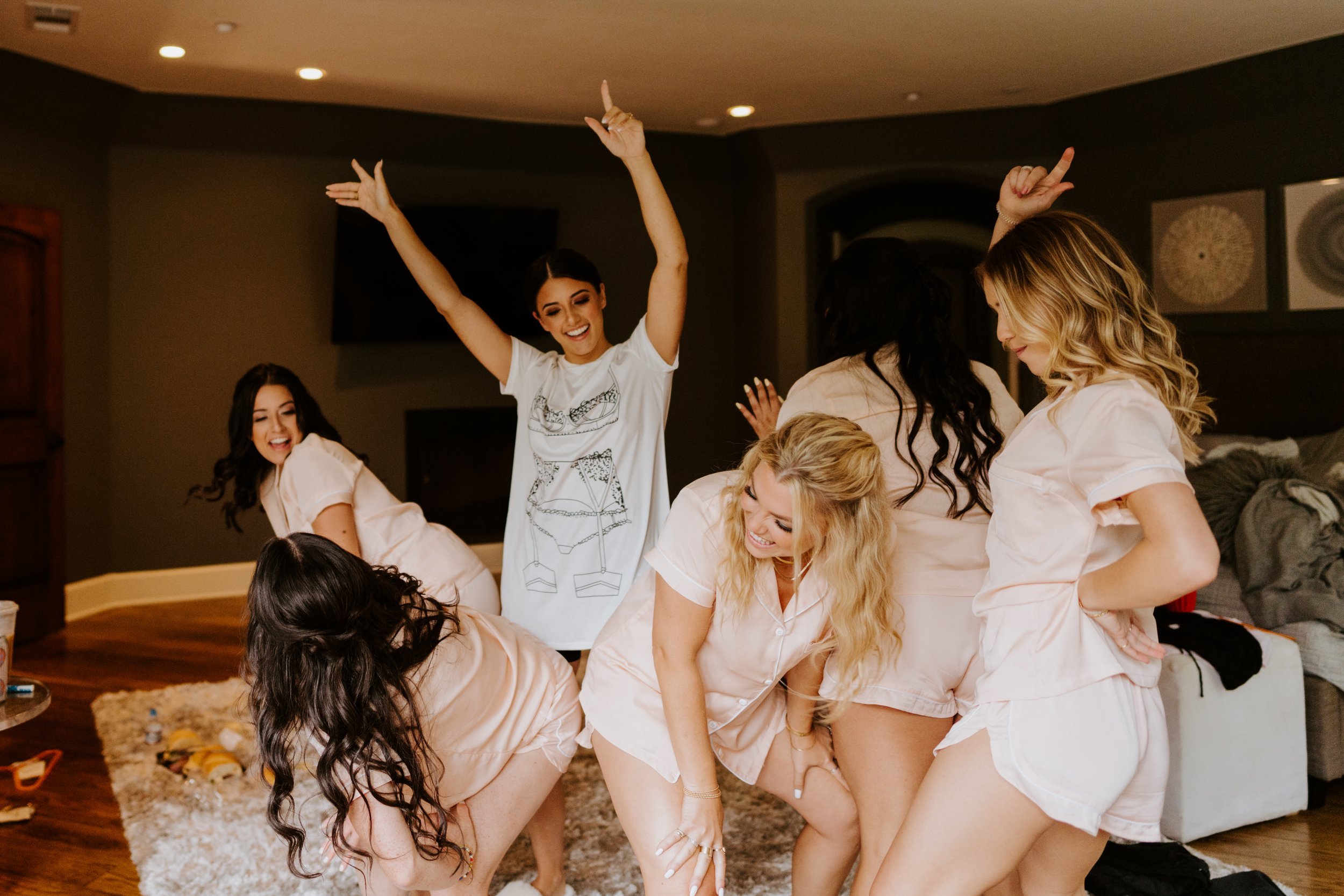 Fun dancing bridesmaid getting ready photos at Castle in the Forest Lake Arrowhead, photo by Tida Svy Photography