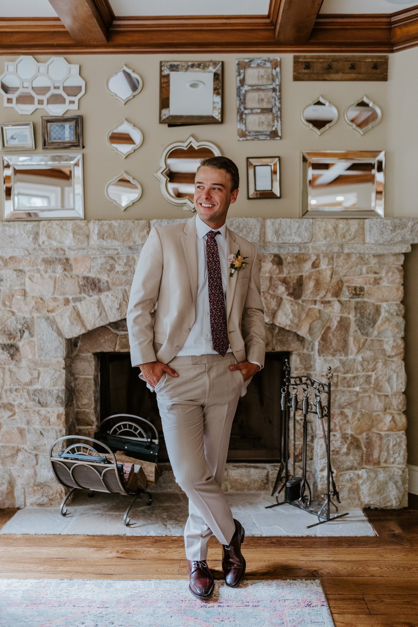 Beige neutral groom suit with maroon tie, getting ready at Castle in the Forest, airbnb wedding in Lake Arrowhead, Photo by Tida Svy