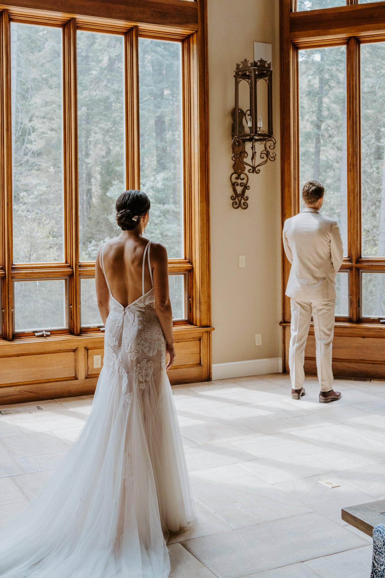 Bride and groom first look at Castle in the Forest in lake arrowhead, airbnb wedding, Photo by Tida Svy