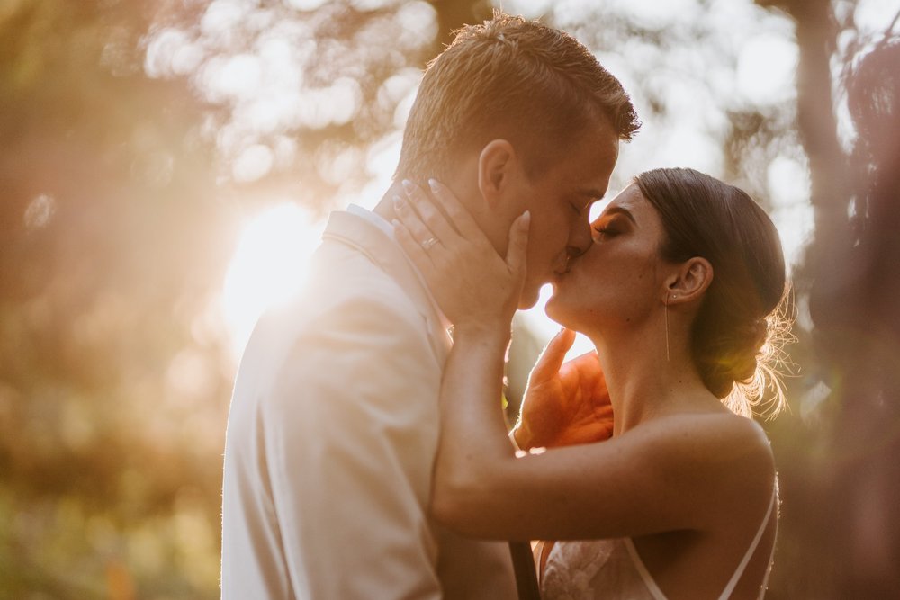 Romantic golden hour intimate and candid Bride and Groom portrait at Castle in the Forest in Lake Arrowhead, Castle Airbnb wedding in southern california, Photo by Tida Svy