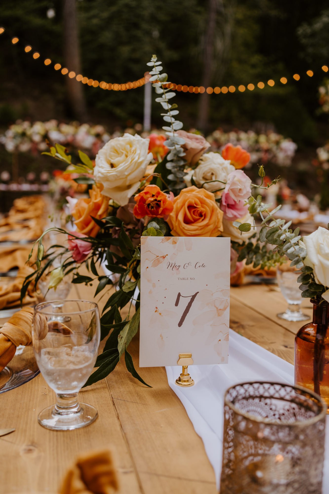 Enchanted forest castle wedding at Castle in the Forest in Lake Arrowhead, magical castle airbnb wedding, orange pink and beige wedding centerpiece, photography by Tida Svy