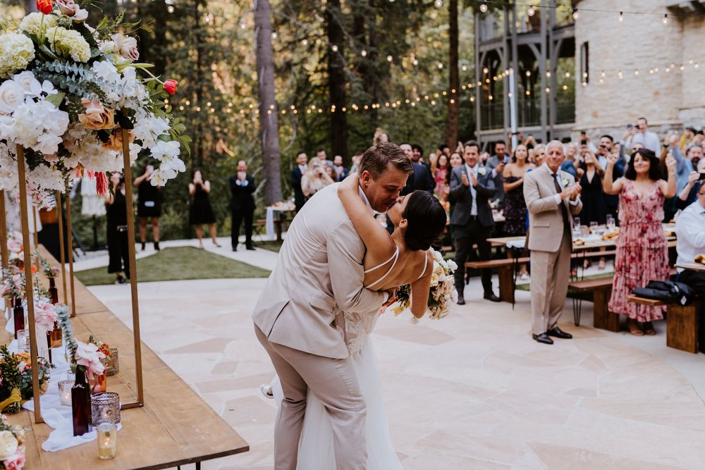 Fun bride and groom reception grand entrance, Castle in the Forest Lake Arrowhead airbnb wedding, Photo by Tida Svy