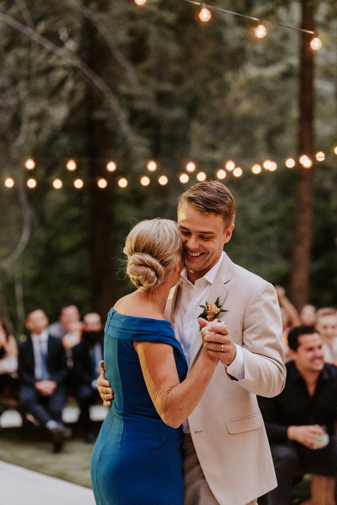 Groom and mother of the groom dance, Castle in the Forest Lake Arrowhead airbnb wedding, Photo by Tida Svy