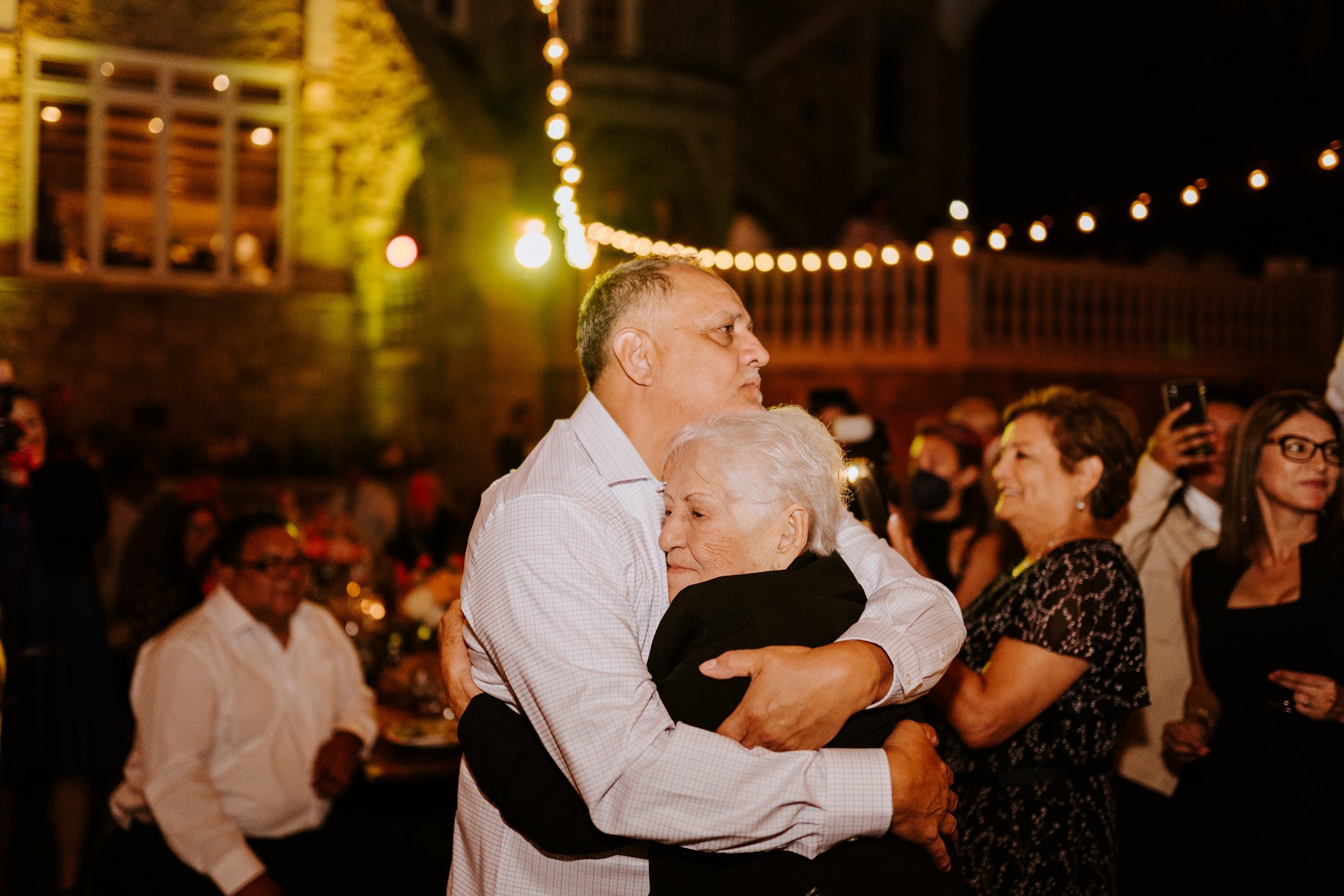 Fun candid dancing wedding reception photography, Castle in the Forest Lake Arrowhead airbnb wedding, Photo by Tida Svy