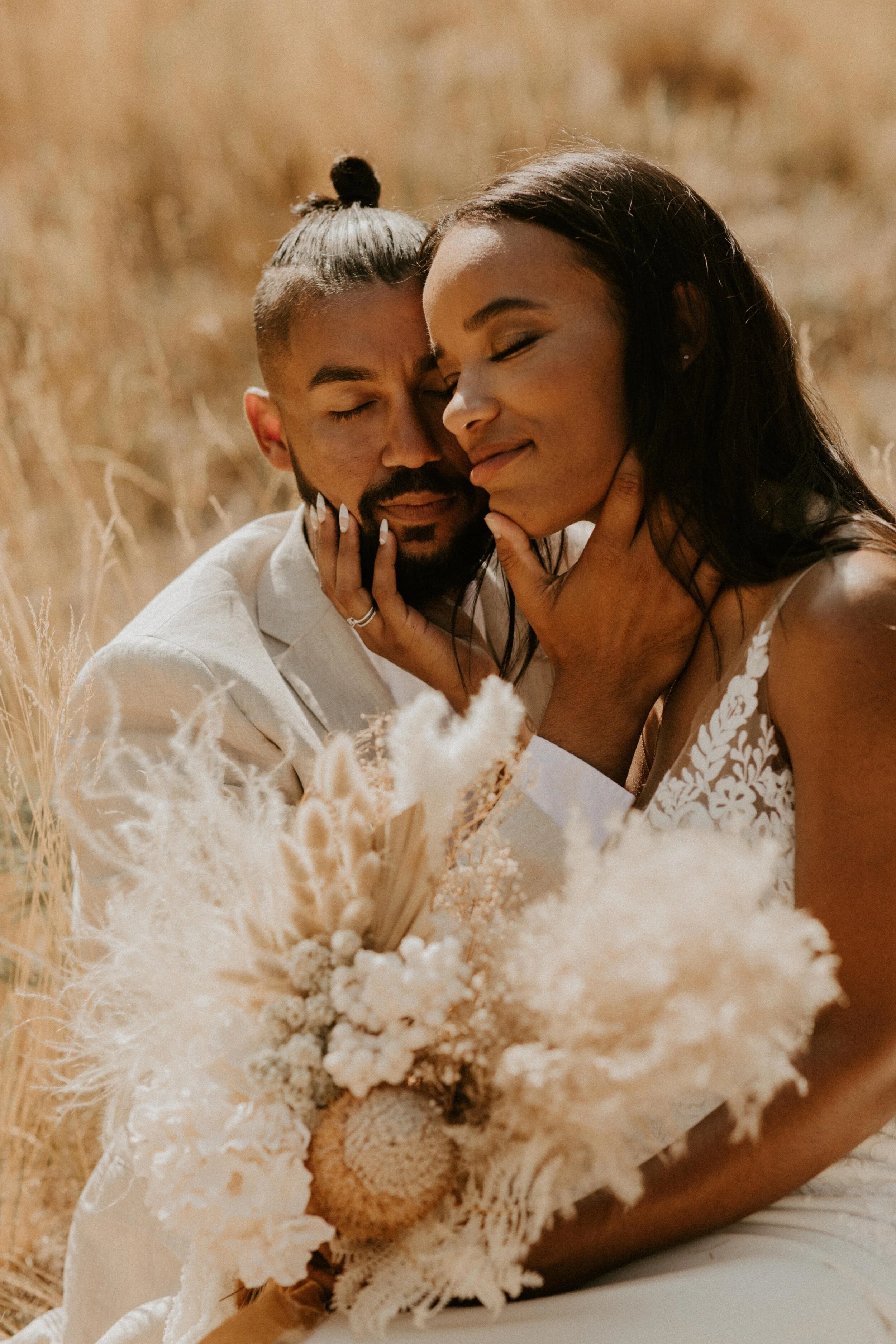 Editorial bride and groom in wheat field with boho dried floral bouquet by Reed and Rye, Yosemite Elopement, El Capitan Meadow, Yosemite Valley, Tida Svy Photography