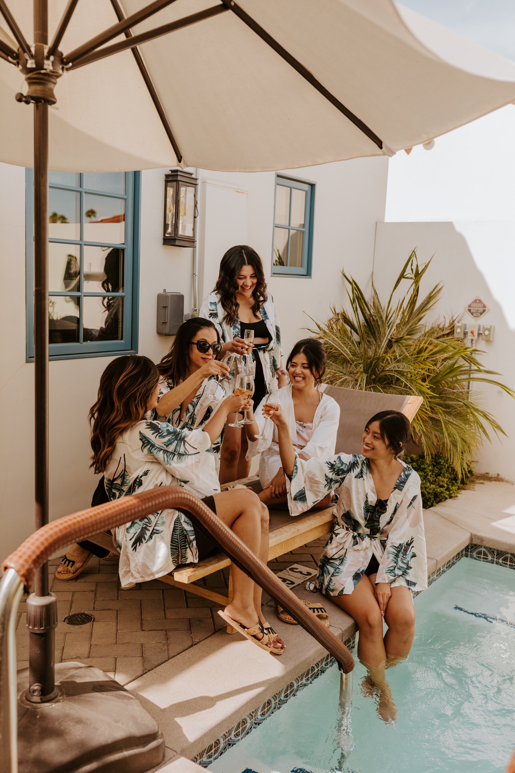 Bridesmaids in matching Tropical Robes by the pool at La Serena Villas Palm Springs, Palm Springs Wedding Photographer, Photo by Tida Svy