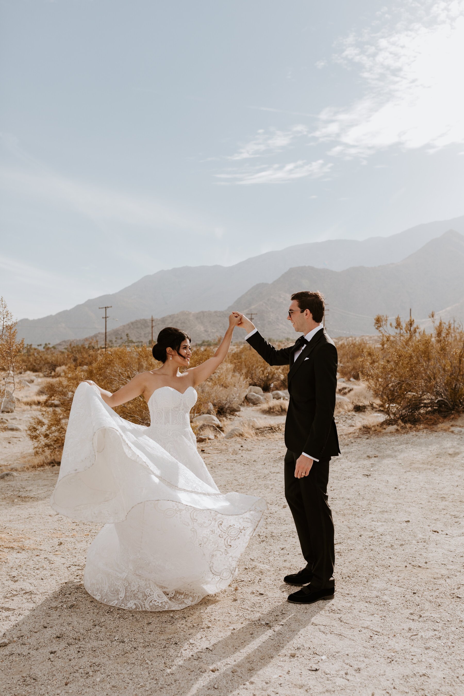 Bride and Groom twirling, Palm Springs Wedding and Elopement Photographer, Photo by Tida Svy