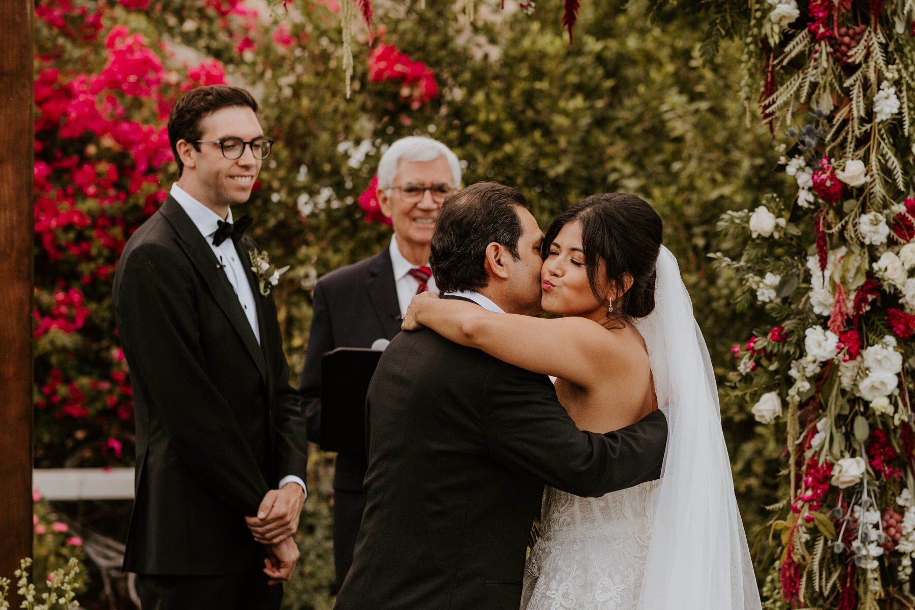 Father of the Bride hugging Bride at the end of the aisle, Spencer’s Restaurant Palm Springs Wedding, Palm Springs Wedding Photographer | Tida Svy Photo