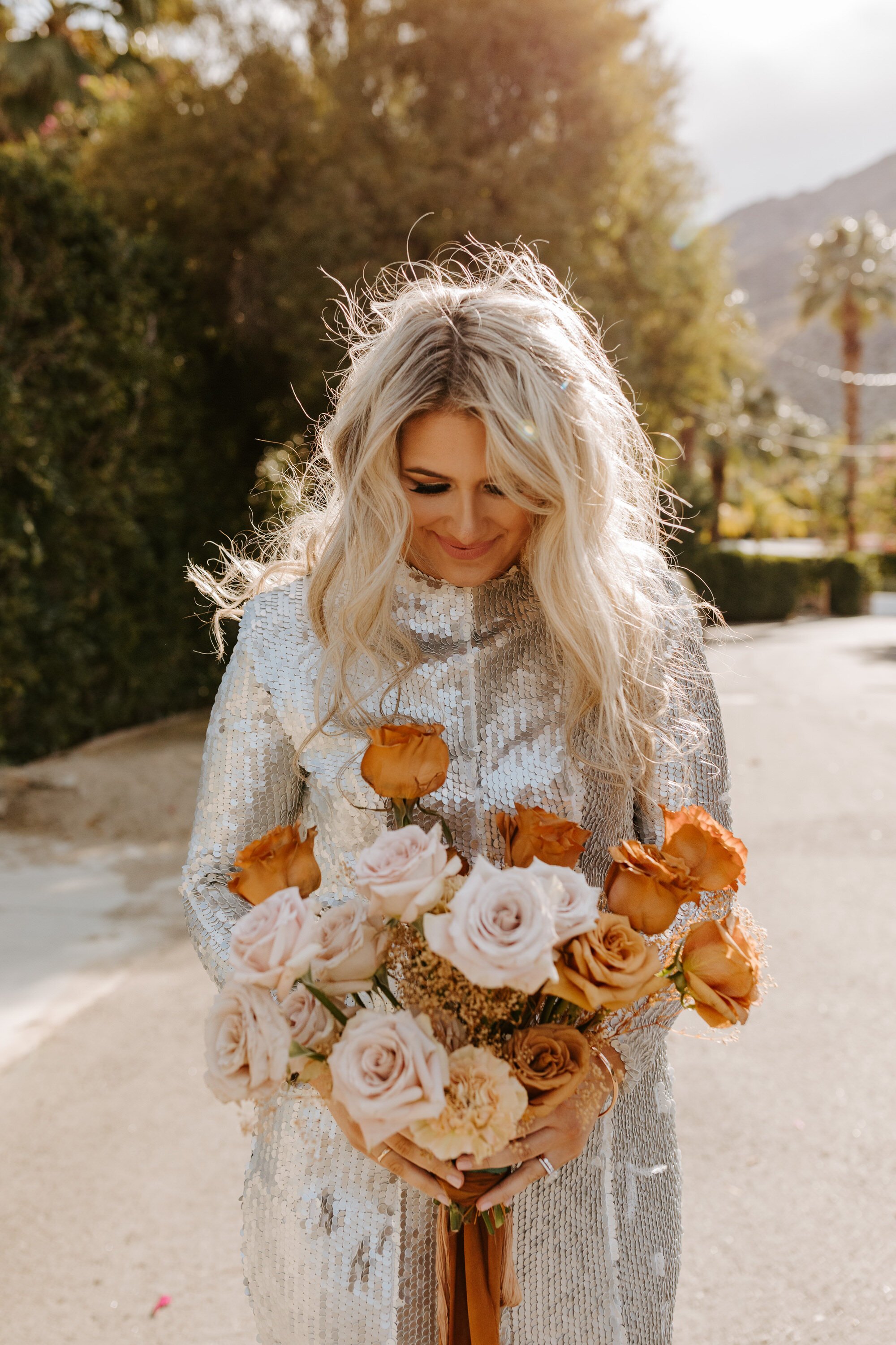 Palm Springs elopement | Silver sequin wedding dress | Neutral ombre bouquet with rust ribbon | Palm Springs Wedding Photographer | Tida Svy | www.tidasvy.com