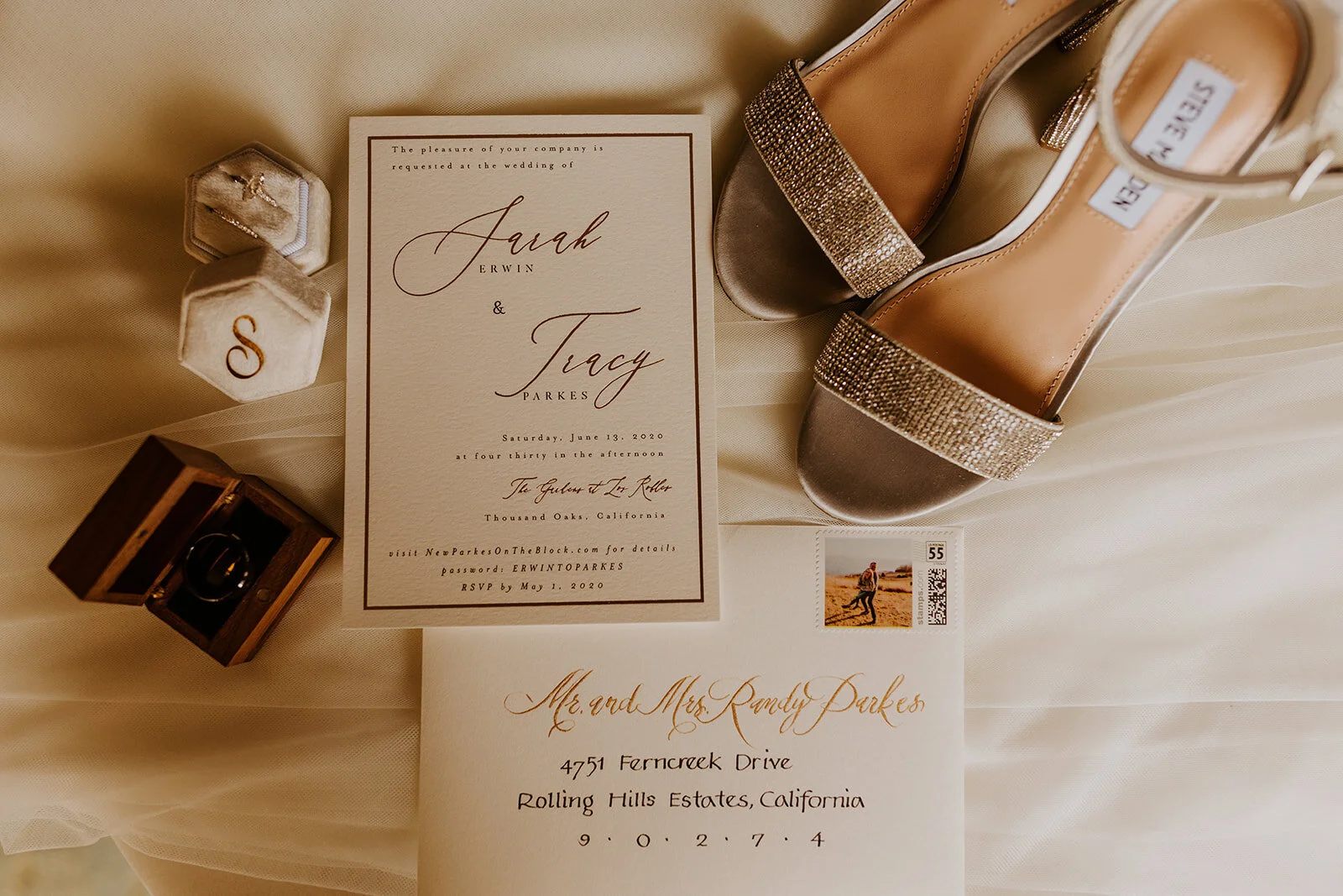 Elegant boho wedding invitation flat lay details, ring photo, silver jeweled shoes, Photo by Tida Svy Photography
